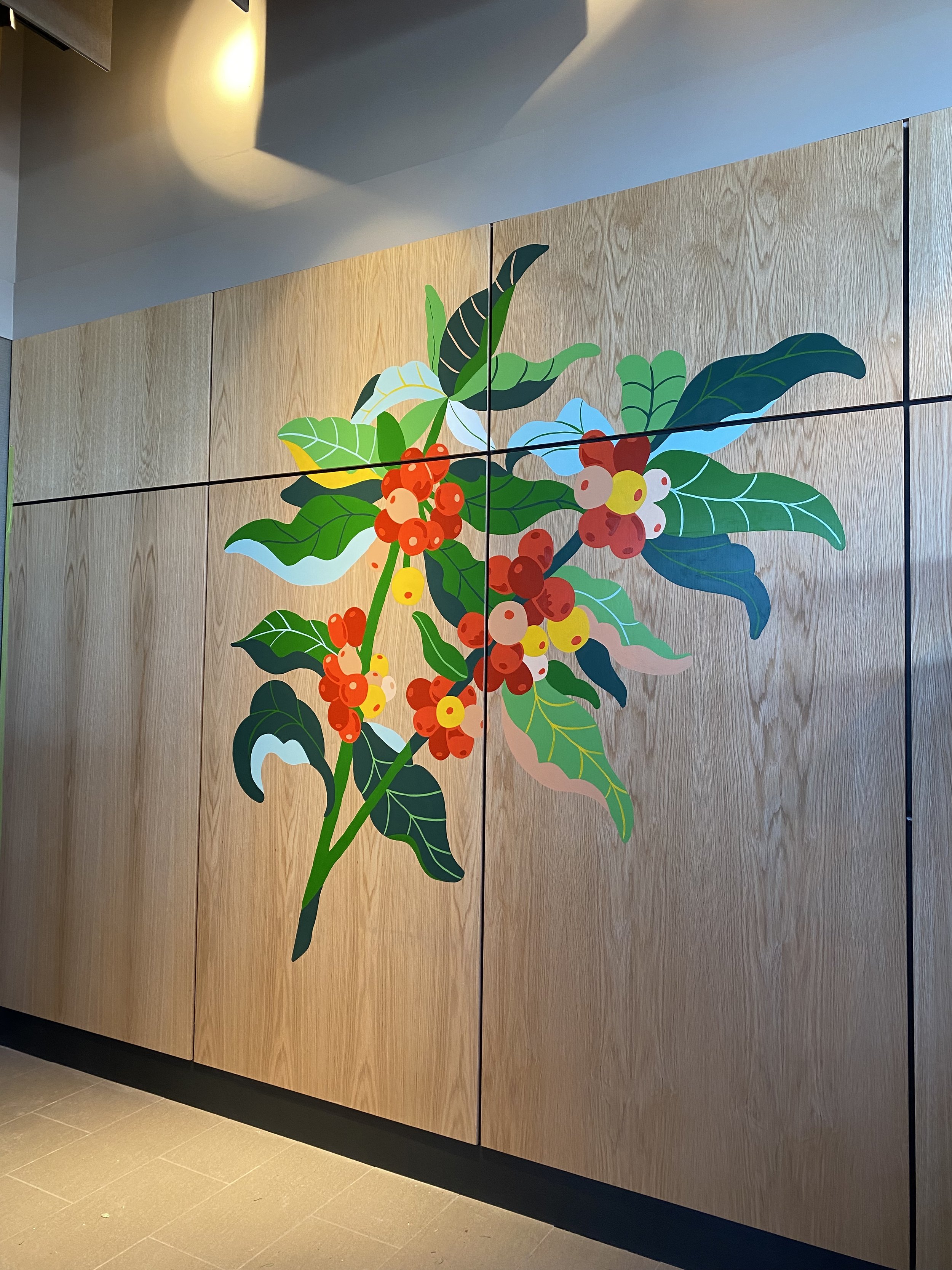 Starbucks mural recreated by Arty Guava, enriching the coffee house’s indoor atmosphere.