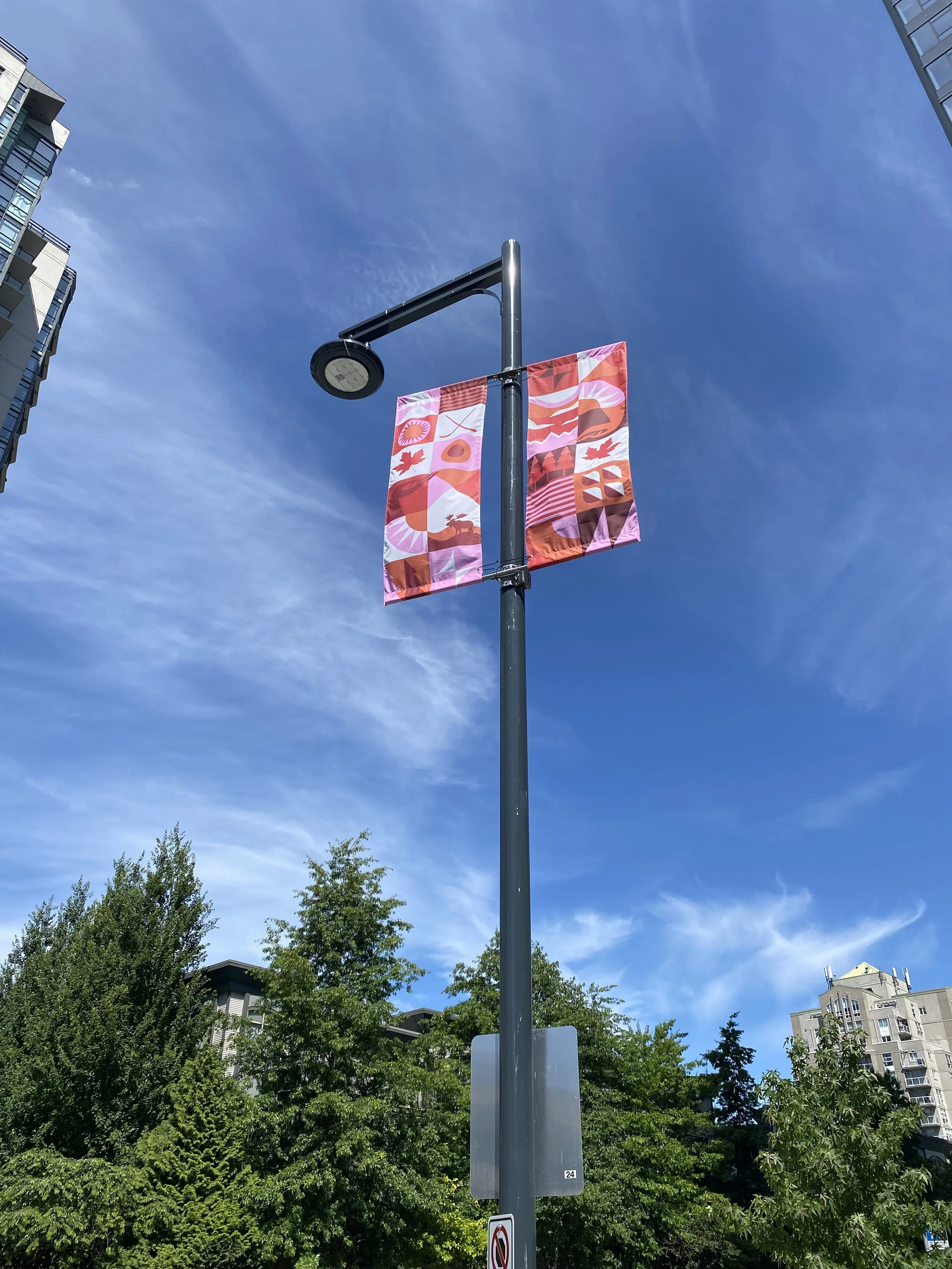 Canada Forward street banners by Arty Guava and Angie Coates in the City of Surrey, featuring vibrant colours and expressive forms celebrating diversity, inclusion, and community.