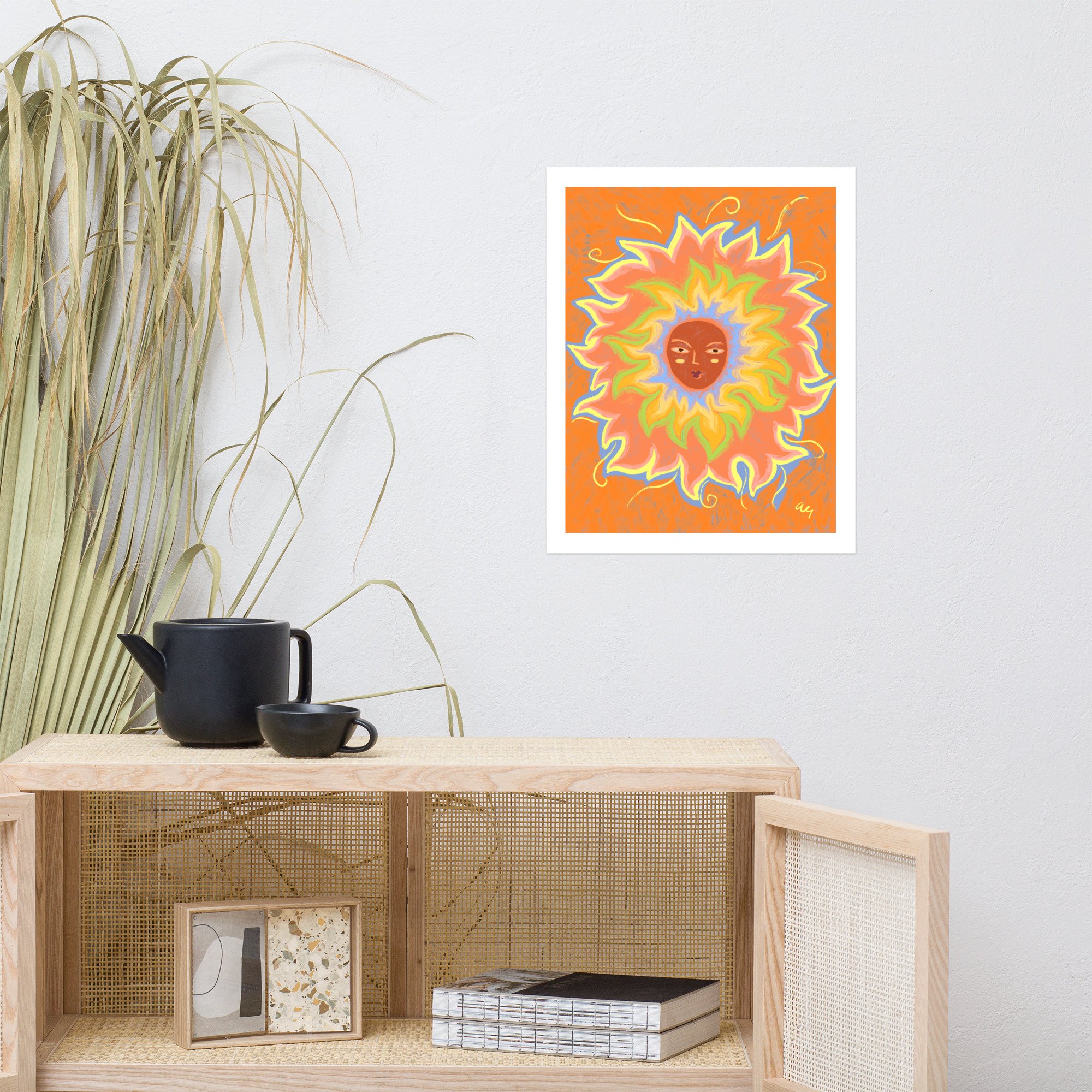 Illustrated sun with a woman's face and rainbow rays.