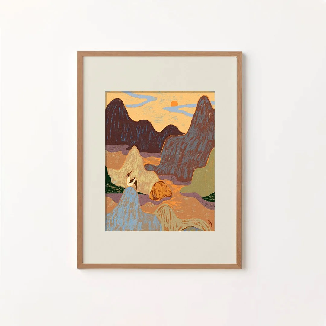 Woman sitting atop a mountain gazing up at the sky.
