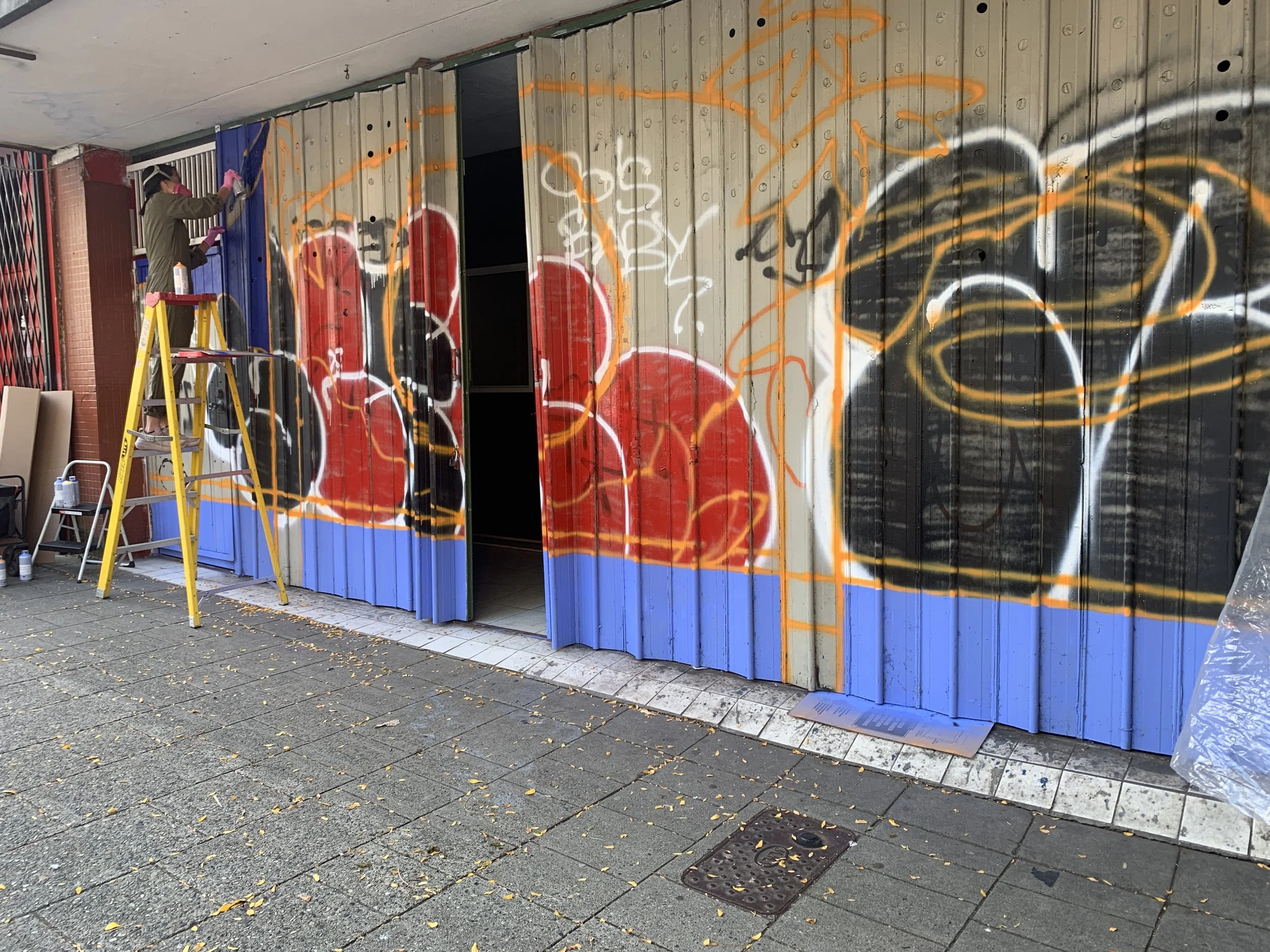 Arty Guava Chinatown mural inspired by the Mid-Autumn Festival, featuring vibrant colours, flowing figures, and symbolic elements celebrating reunion, moonlight, and cultural heritage.