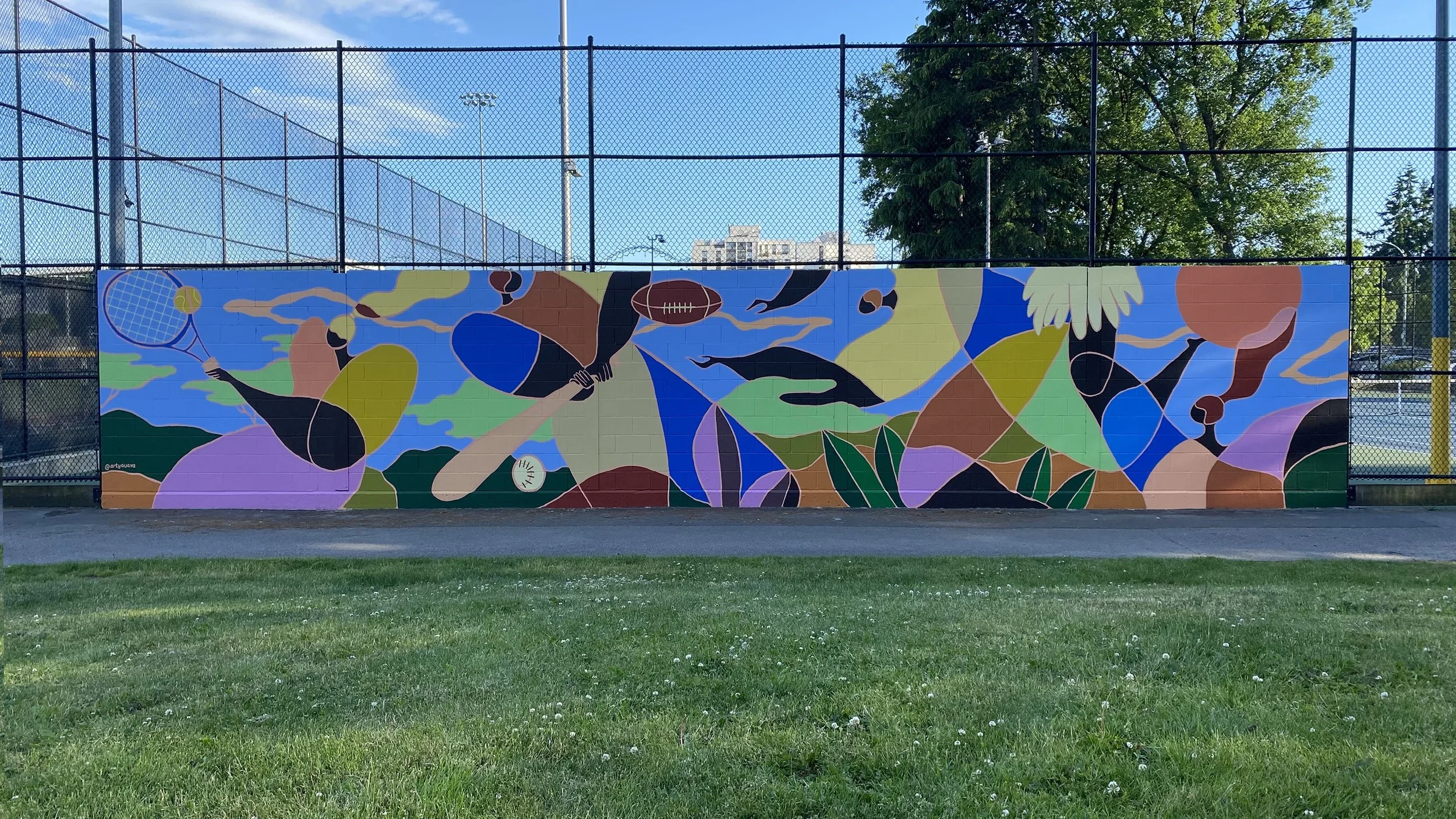Arty Guava mural at Minoru Park Tennis Court in Richmond, featuring vibrant colours and joyful figures inspired by movement, sport, and community in a public outdoor space.