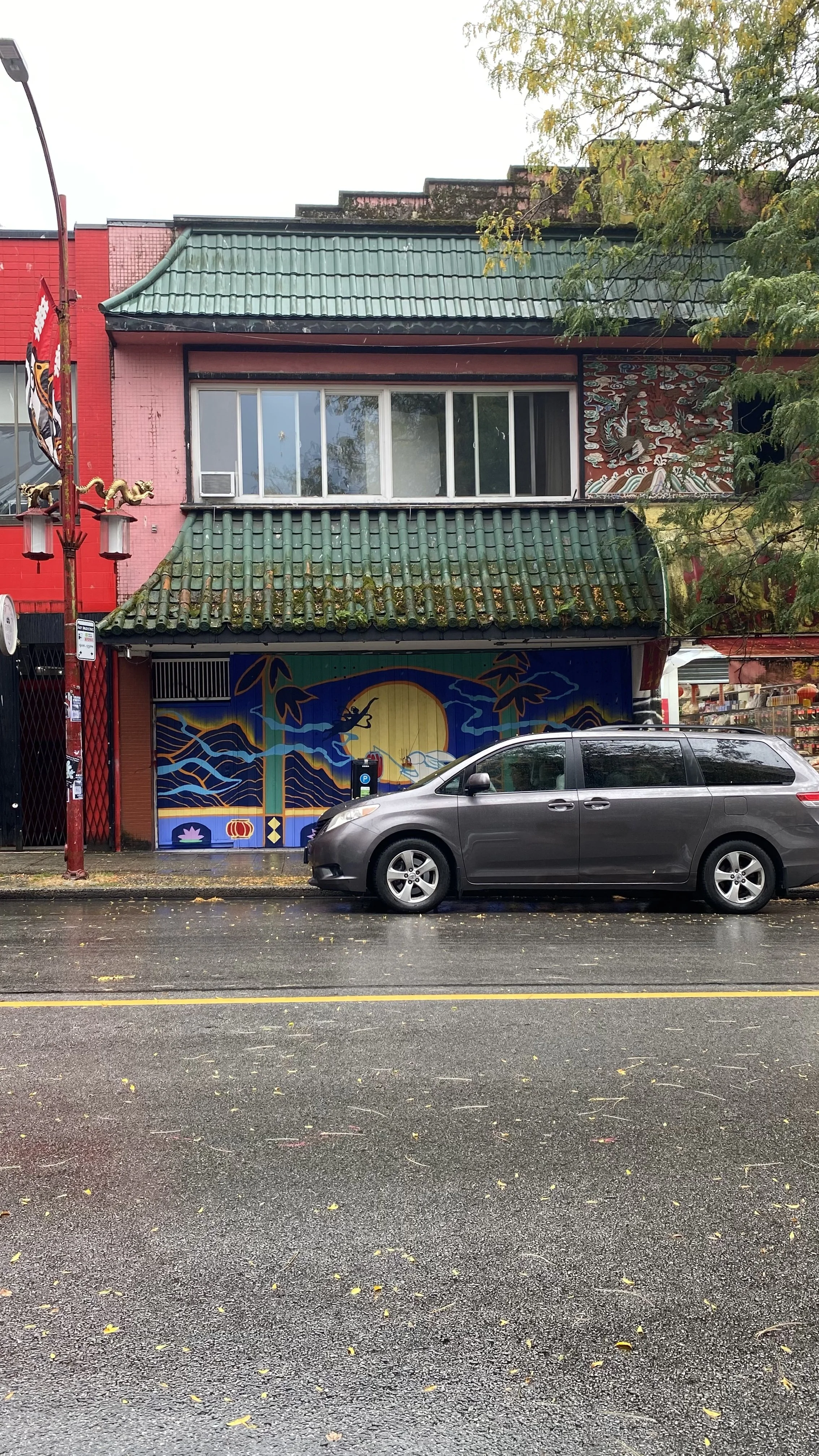 Arty Guava Chinatown mural inspired by the Mid-Autumn Festival, featuring vibrant colours, flowing figures, and symbolic elements celebrating reunion, moonlight, and cultural heritage.