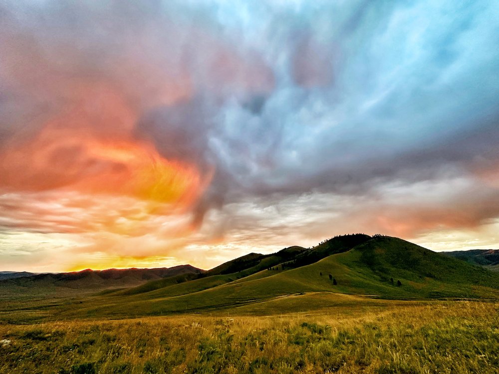 Mongolia Amarbayasgalant Khiid Wild Camping morning sunset hills.jpeg