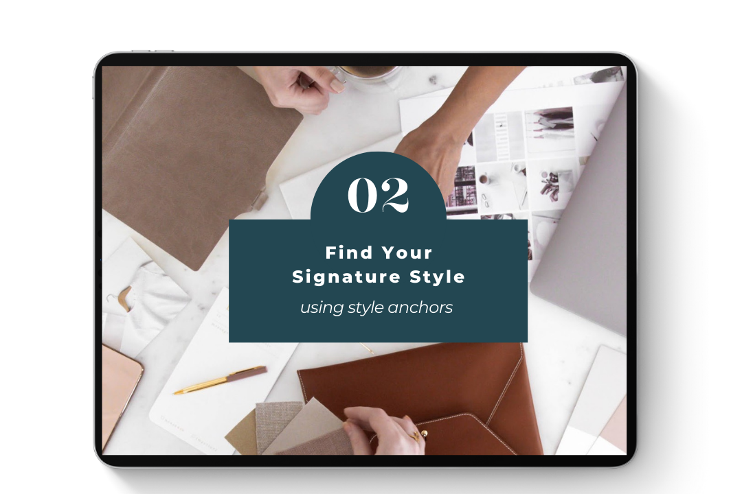 Overhead view of a digital tablet screen showing a guide on finding signature style using style anchors, surrounded by swatches, a pen, notebooks, and fashion images on a desk.