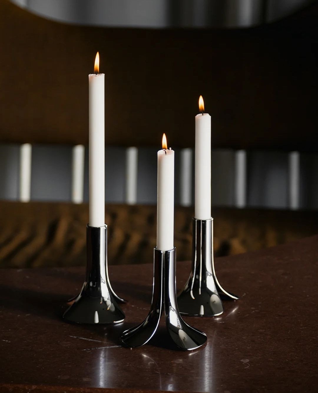 Pinci, which means &ldquo;pliers&rdquo; in Italian, is a die-cast candle holder in Zamac, a metal alloy of zinc and aluminium. The candle holder&rsquo;s sophisticated hinge allows the holder to open and close under its own weight, clamping candles of