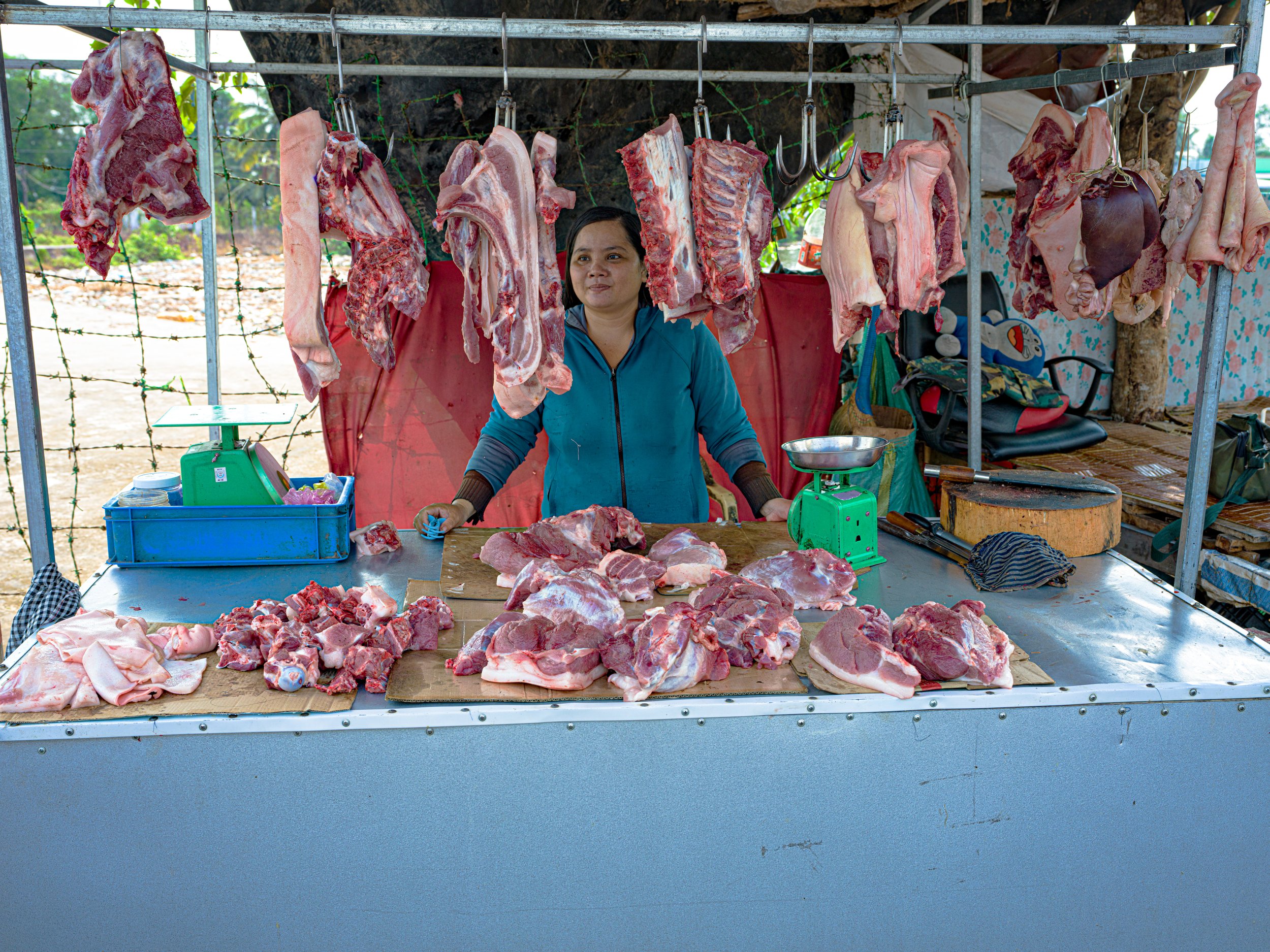  roadside pork meat seller soc trang province…………… about $3 per kg 