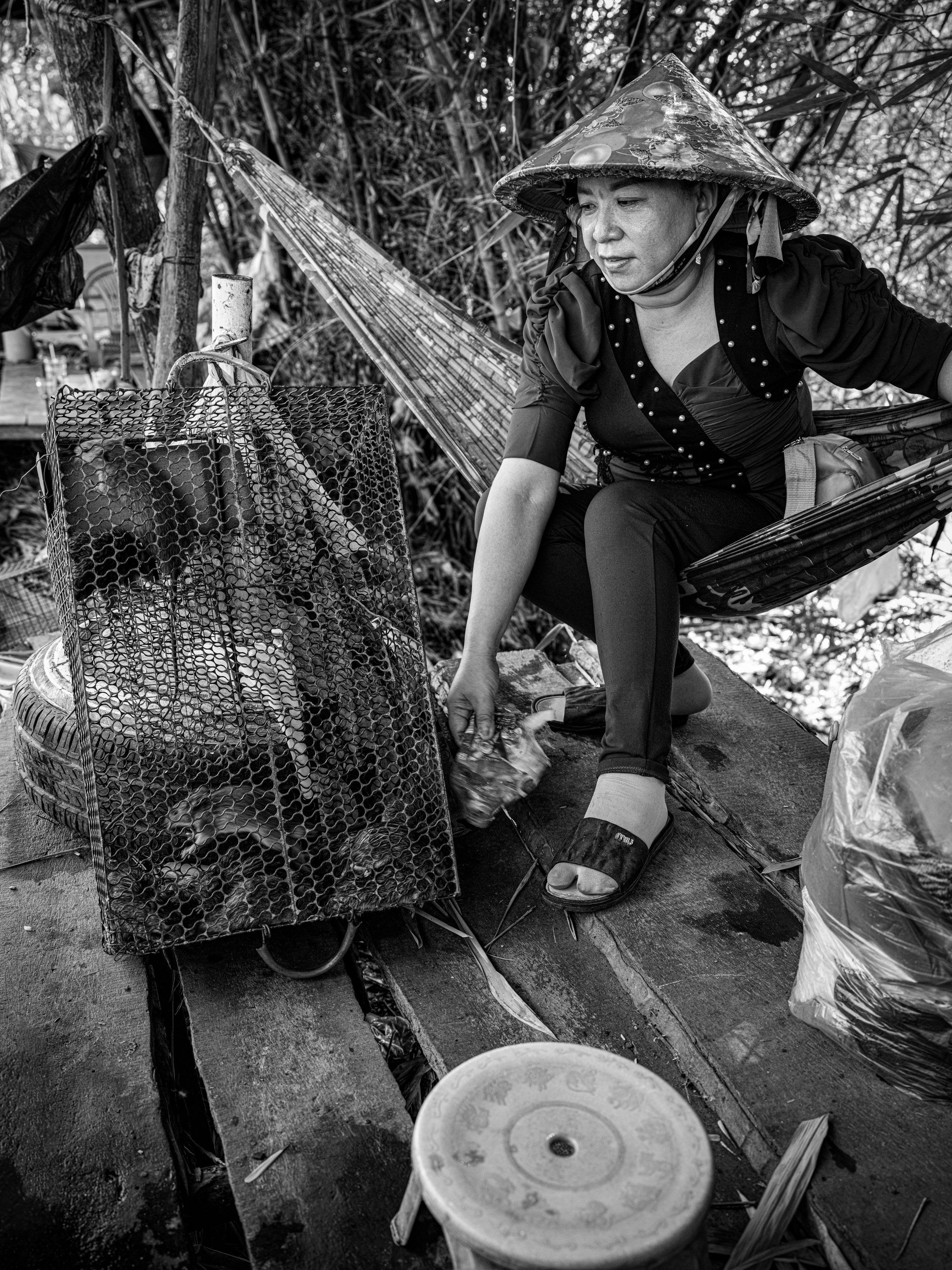  rat meat seller. best ones caught in rice fields. $3 per kilo. Near cao lanh 