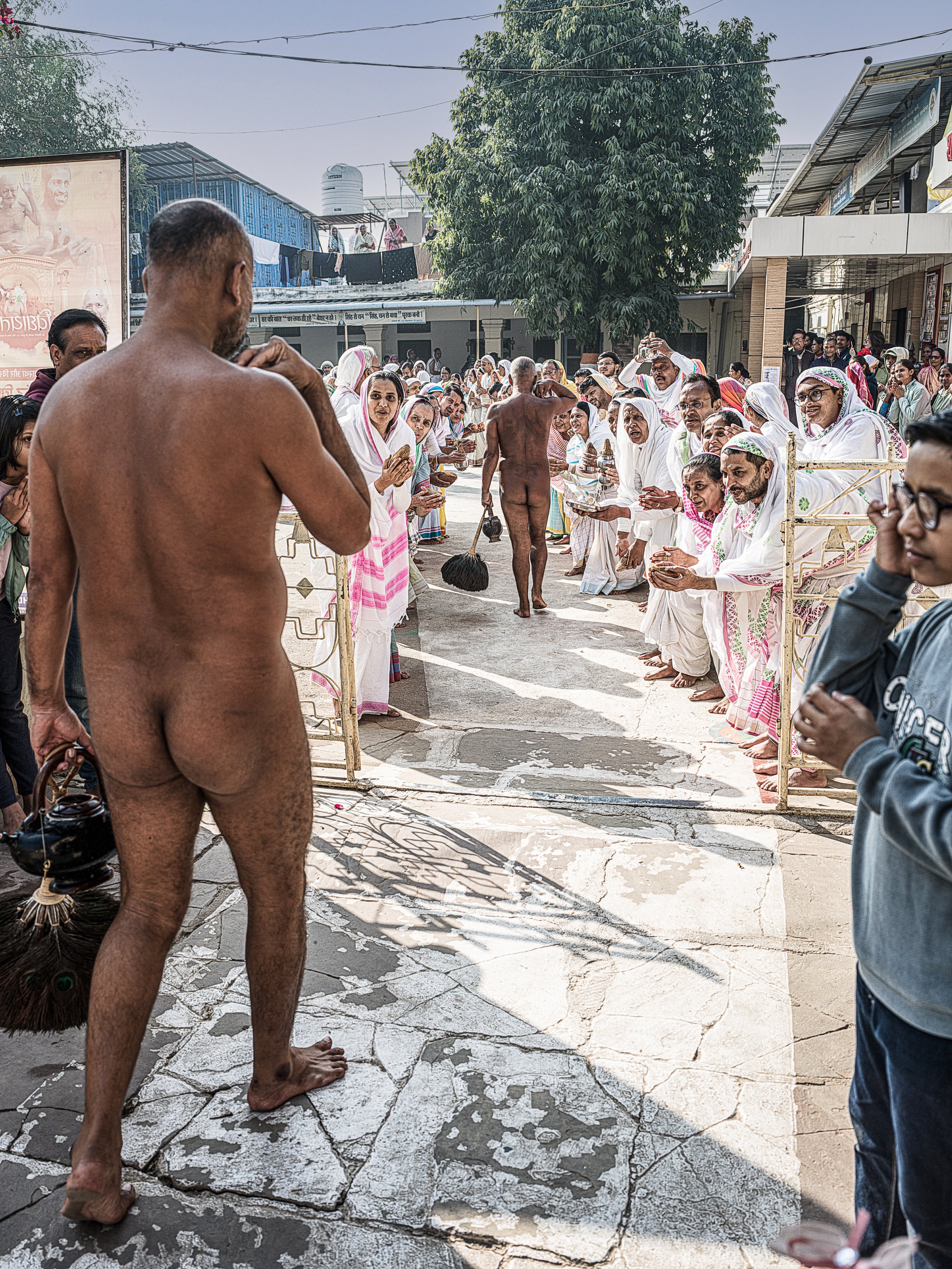digambara jains about to select a household to have lunch