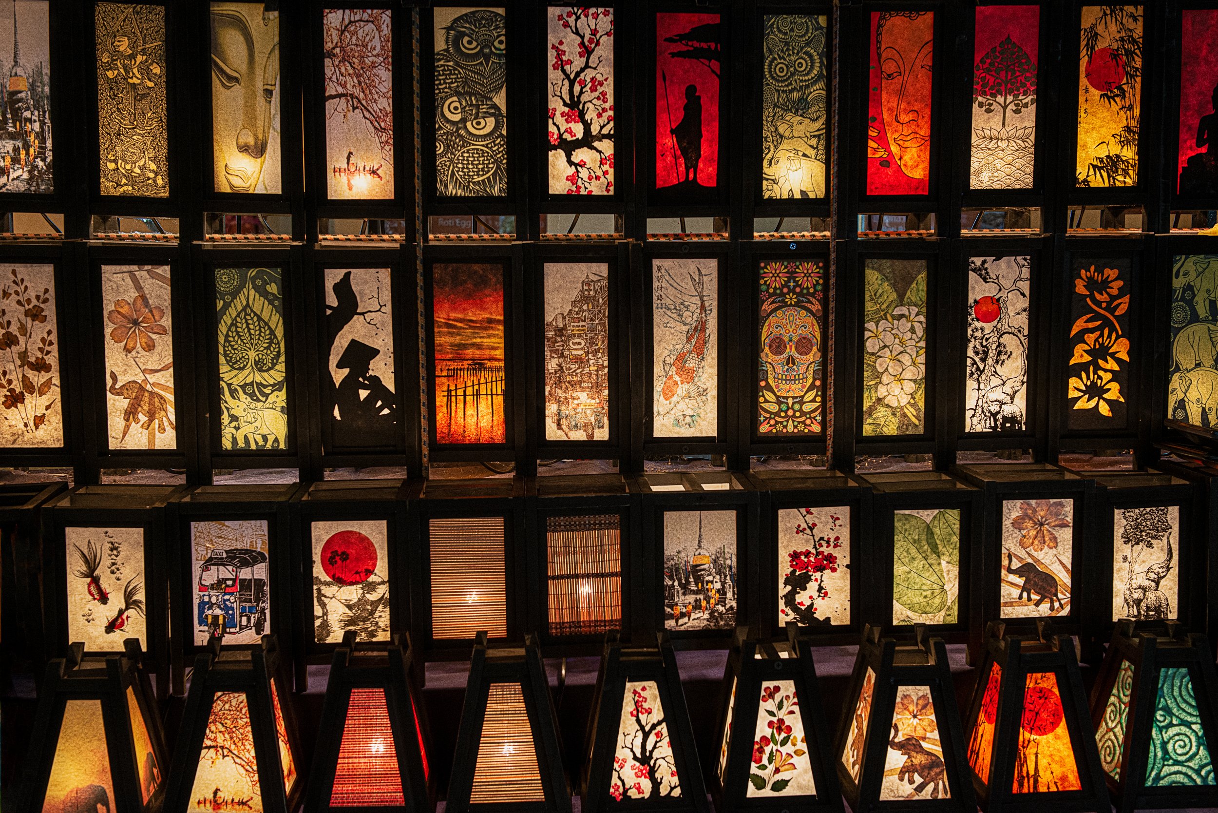 lampshades . market stall , old city , chiang mai