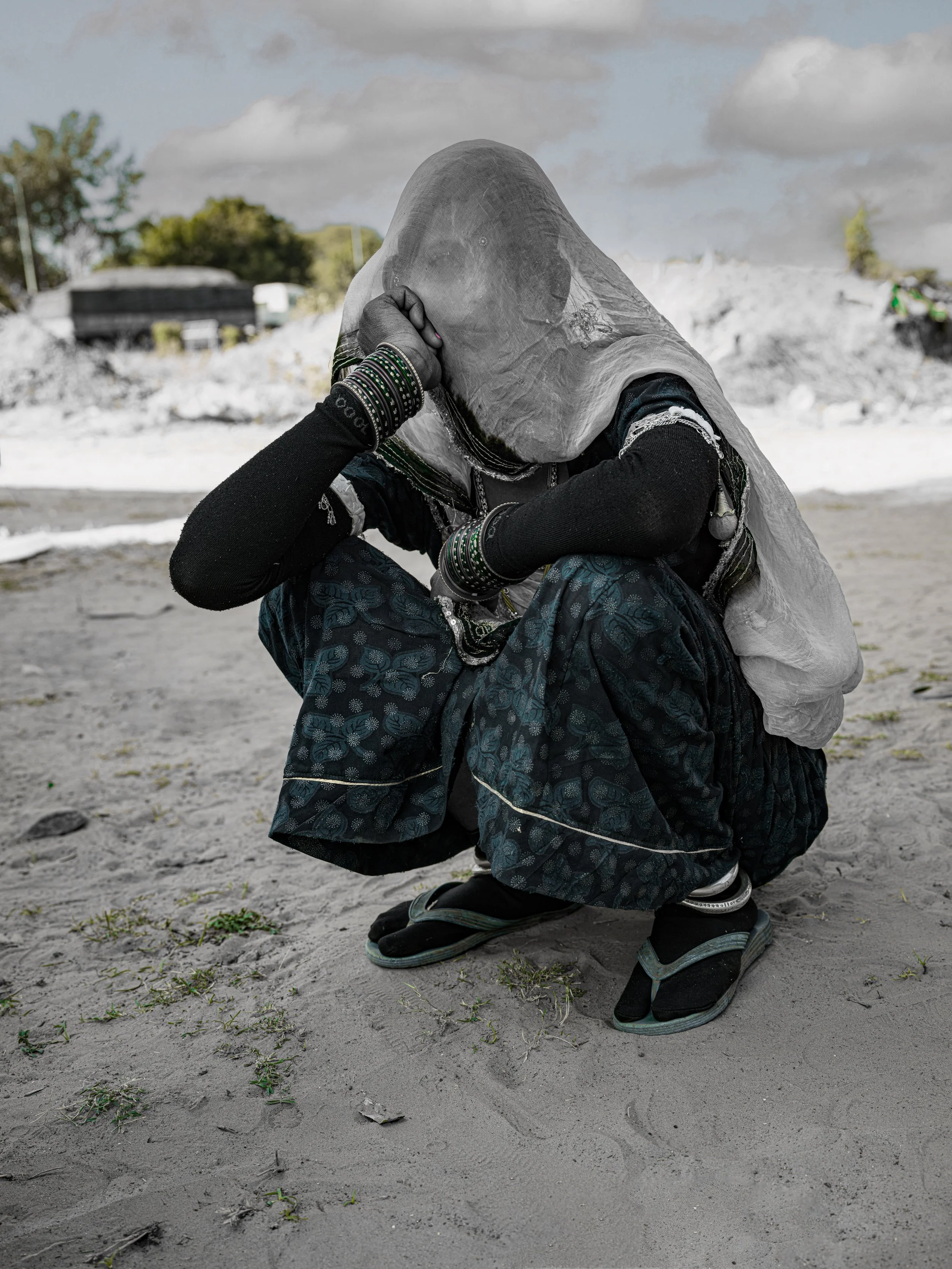 young mother at a roadside camp near delhi