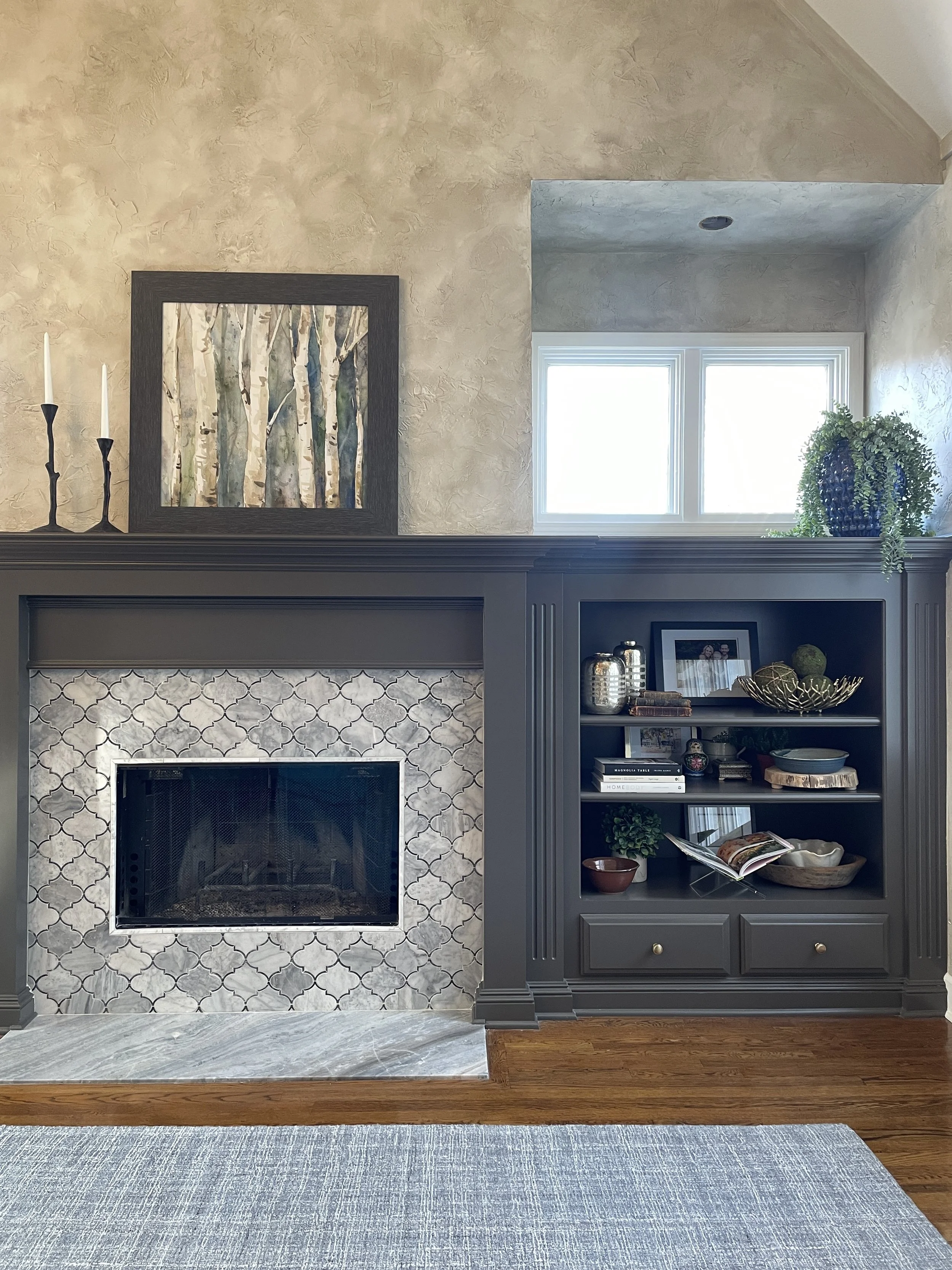 Remodeled Marble Fireplace and Bookcase Transformation in Venice Florida Urbane Bronze and Faux Finish