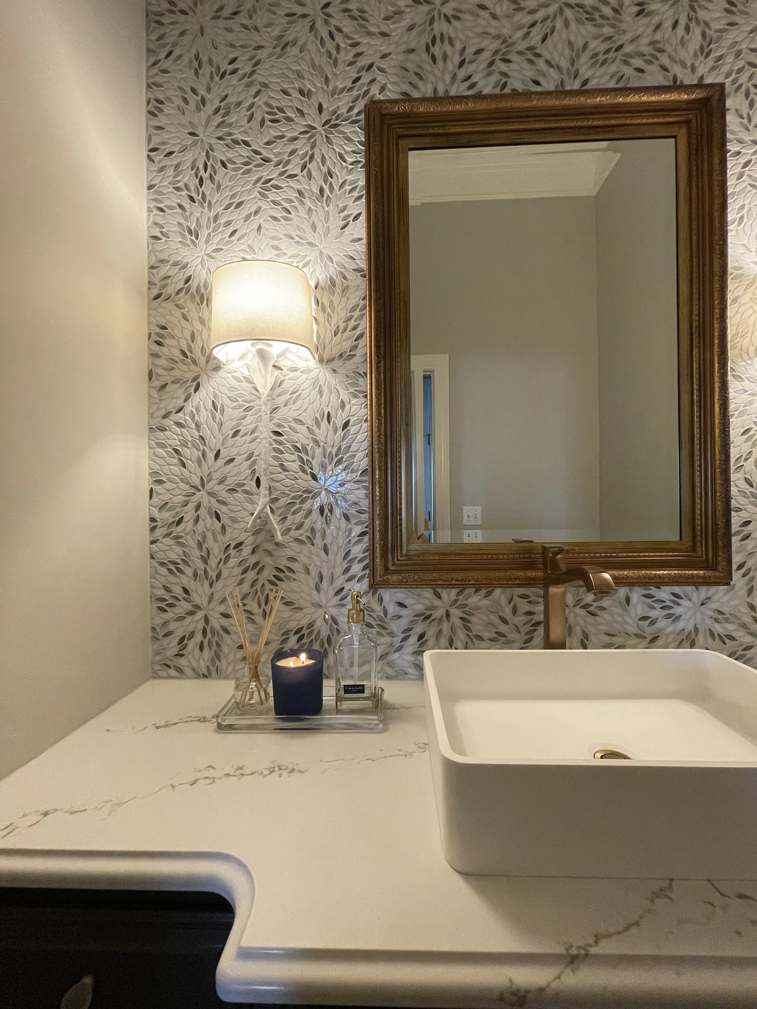 Venice Florida Spa Bathroom Design with Petal Tile, Quartz Counters, and Vessle Sink by Singer Interiors