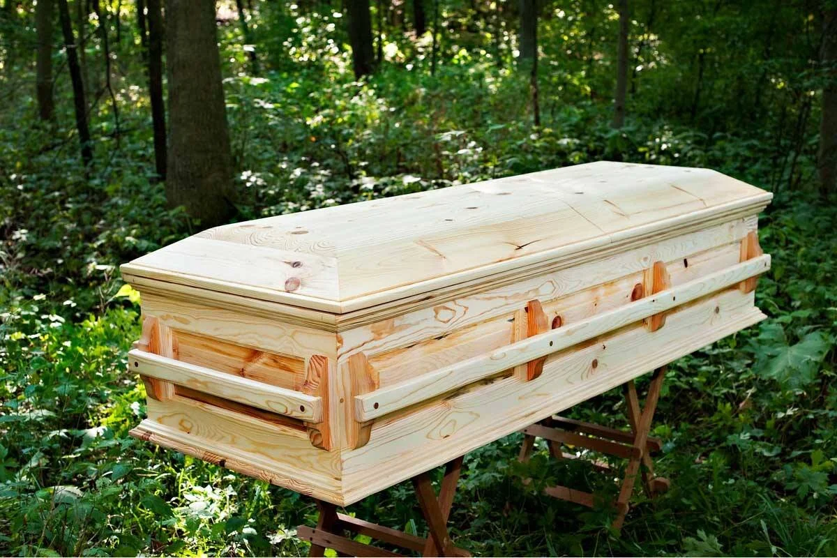 Image of an all wood casket at Prairie Oaks