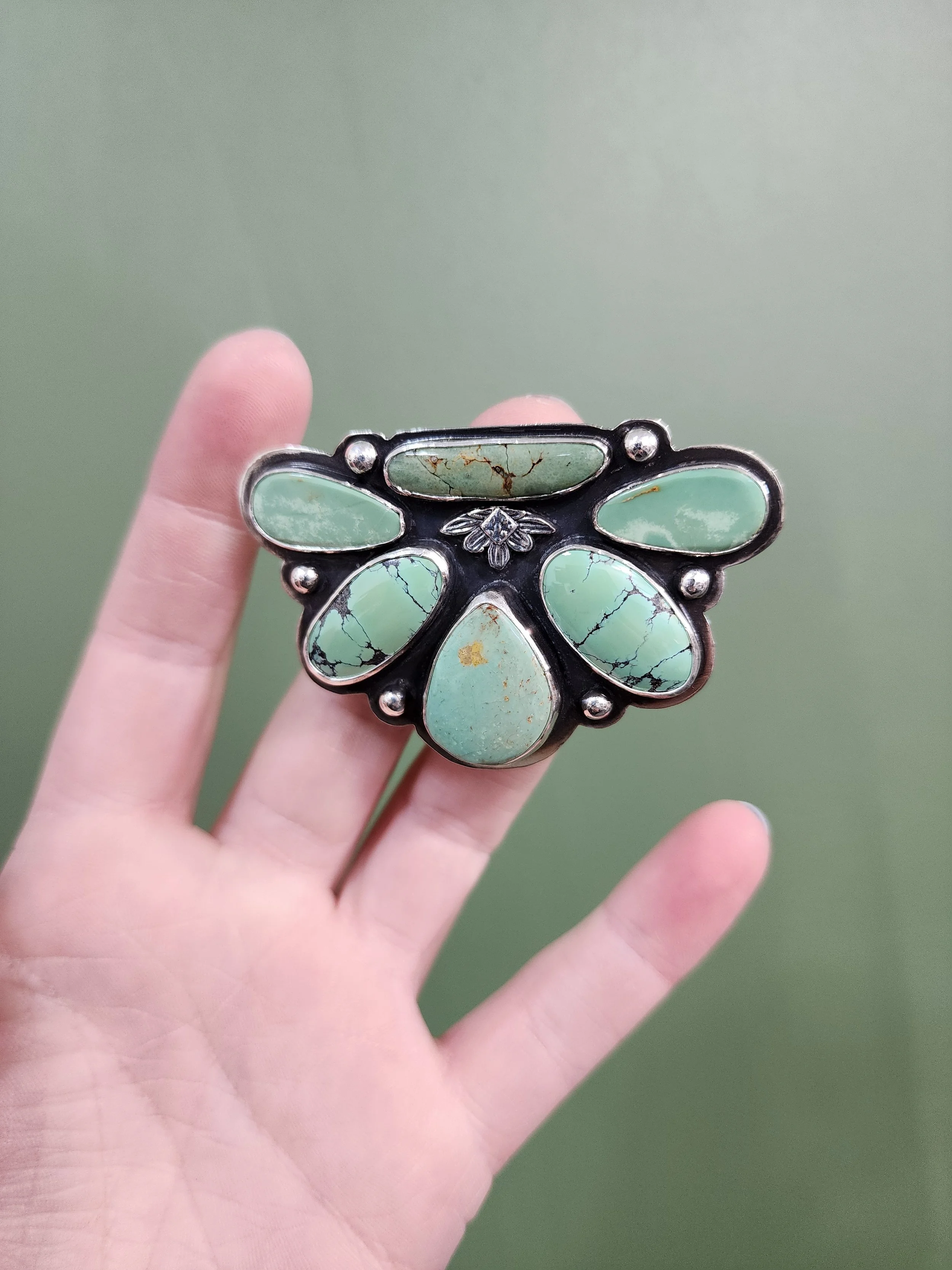 Sentimental wedding hair piece with turquoise and sterling silver. Handmade by Fire and Fringe, showcasing heirloom-quality custom jewelry crafted in the USA.”