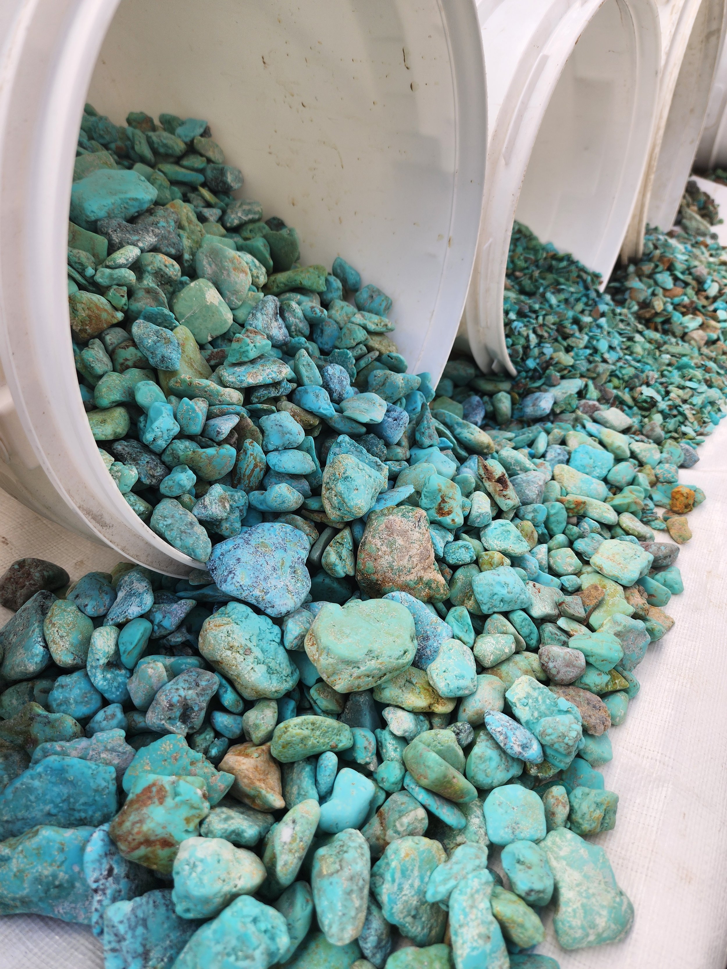 Buckets of raw turquoise