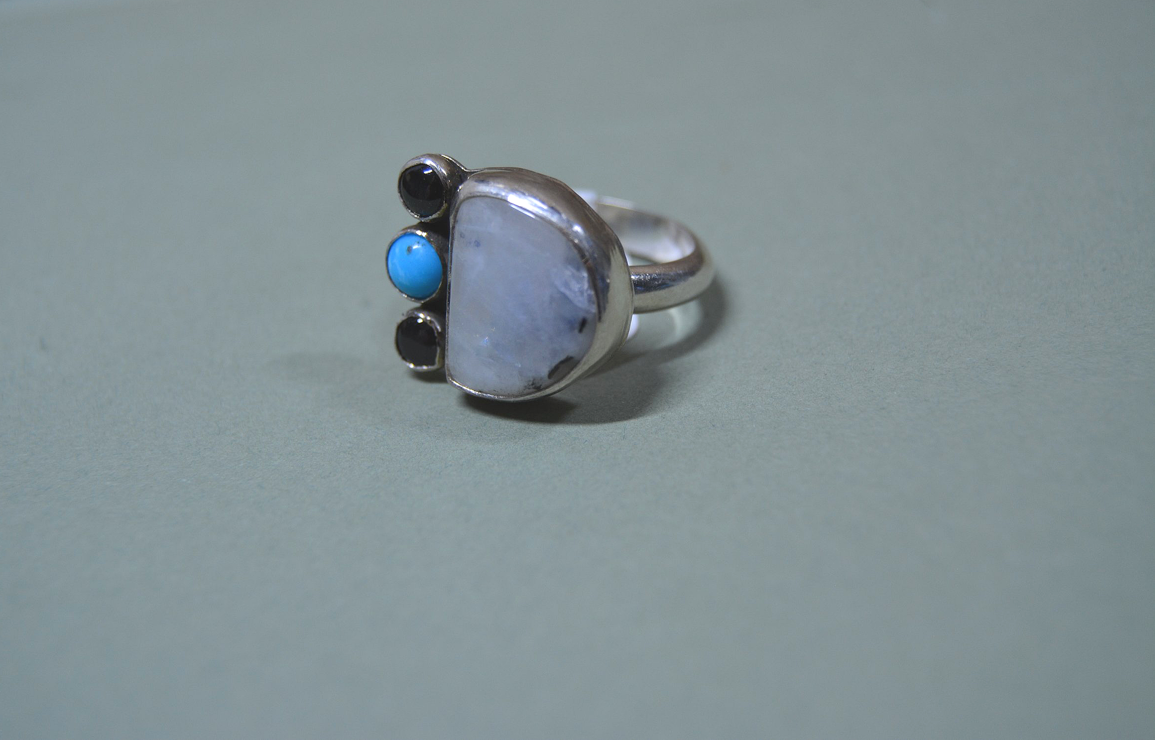 The Eclipse Trio Ring: Moonstone, Onyx, and Turquoise in Silver