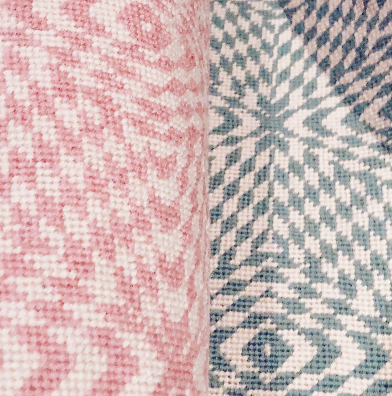 Two little bedroom pillows in the making for siblings. Same geometric design, in our &lsquo;Margot Scarf&rsquo;, but stitched in different wool palettes: a very pale, bluey green and a classic pink. Their initials have been stitched in one of the cor