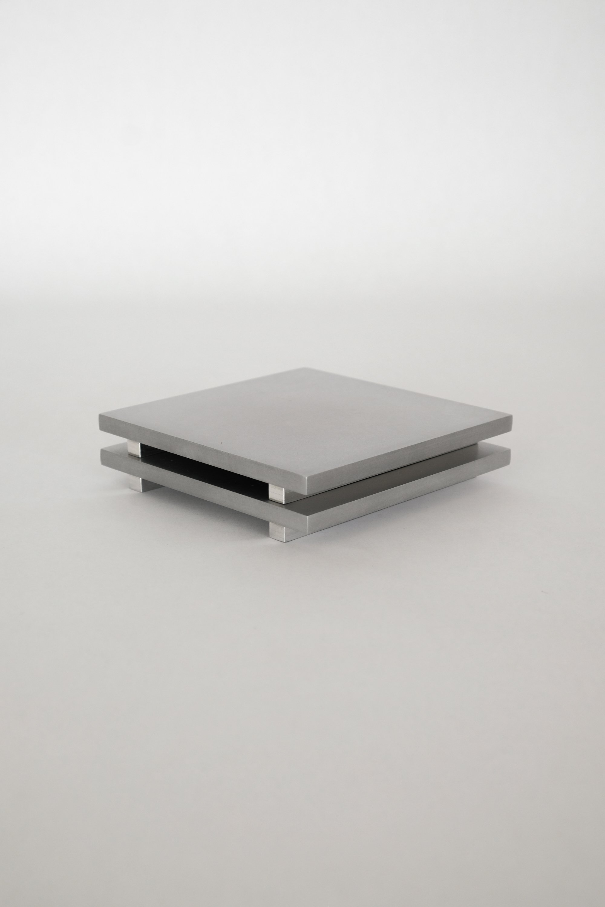 Minimal aluminum coaster