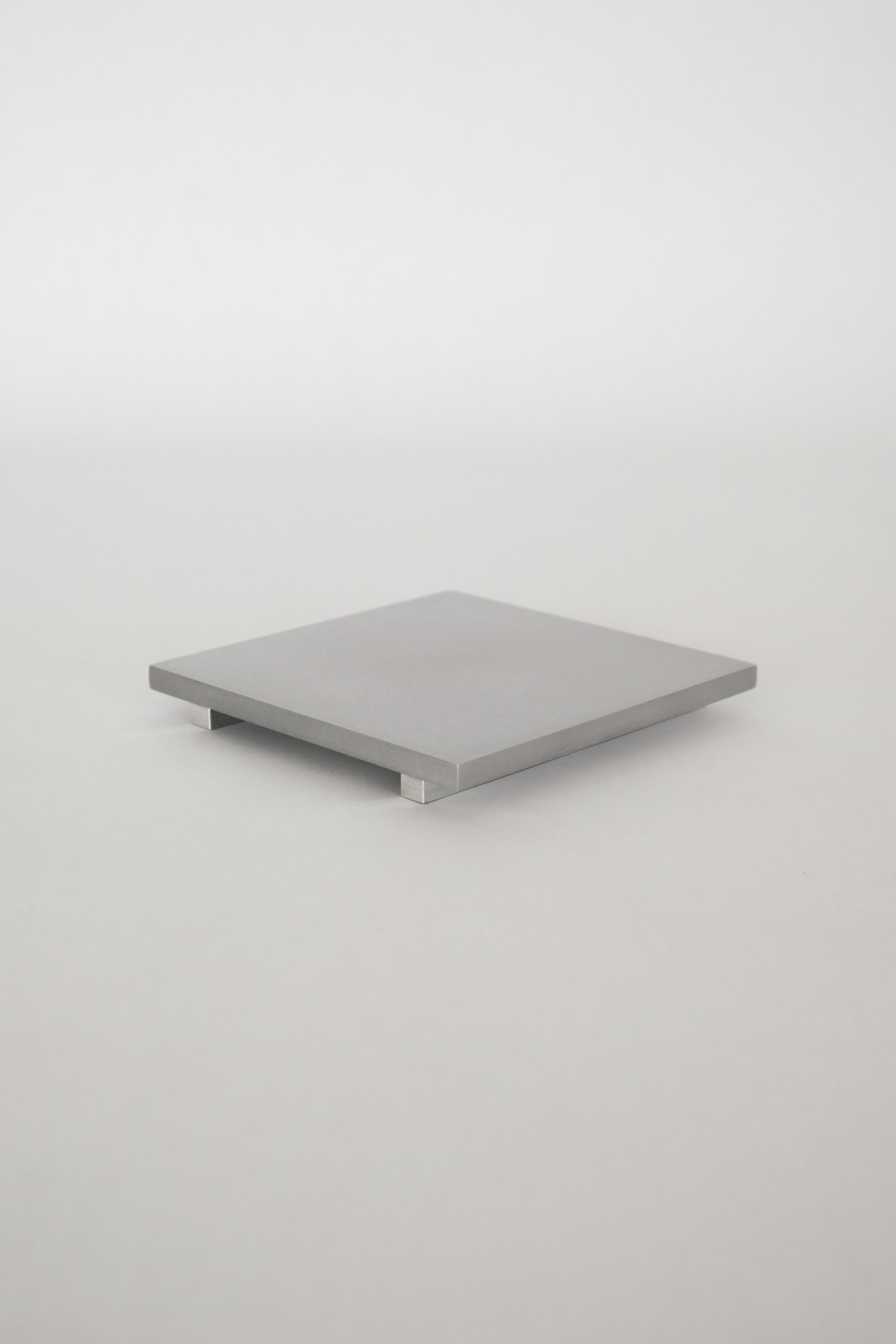 Minimal aluminum coaster