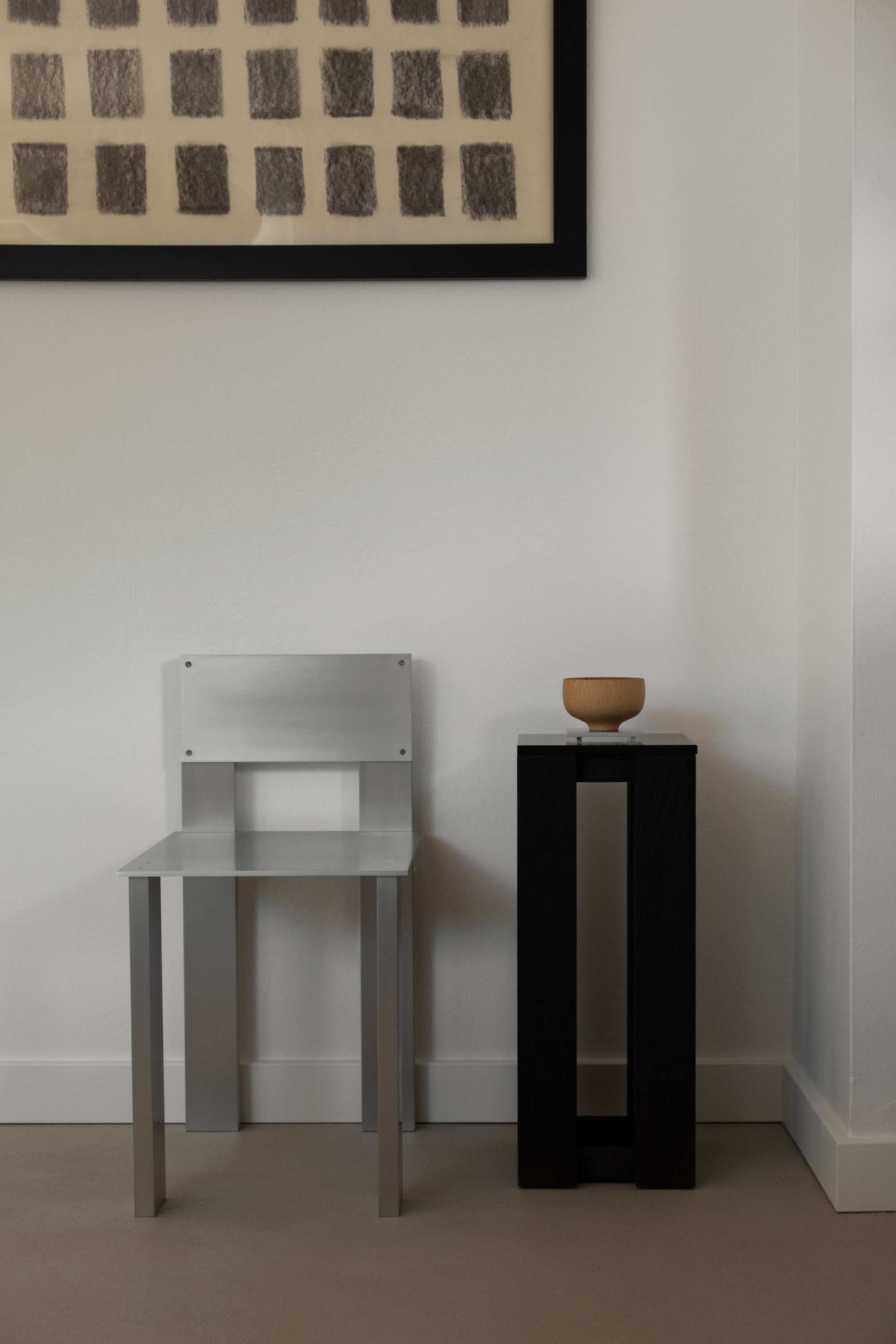 Aluminum chair and yakisugi burnt wood side table, original art by Orlando Pippig