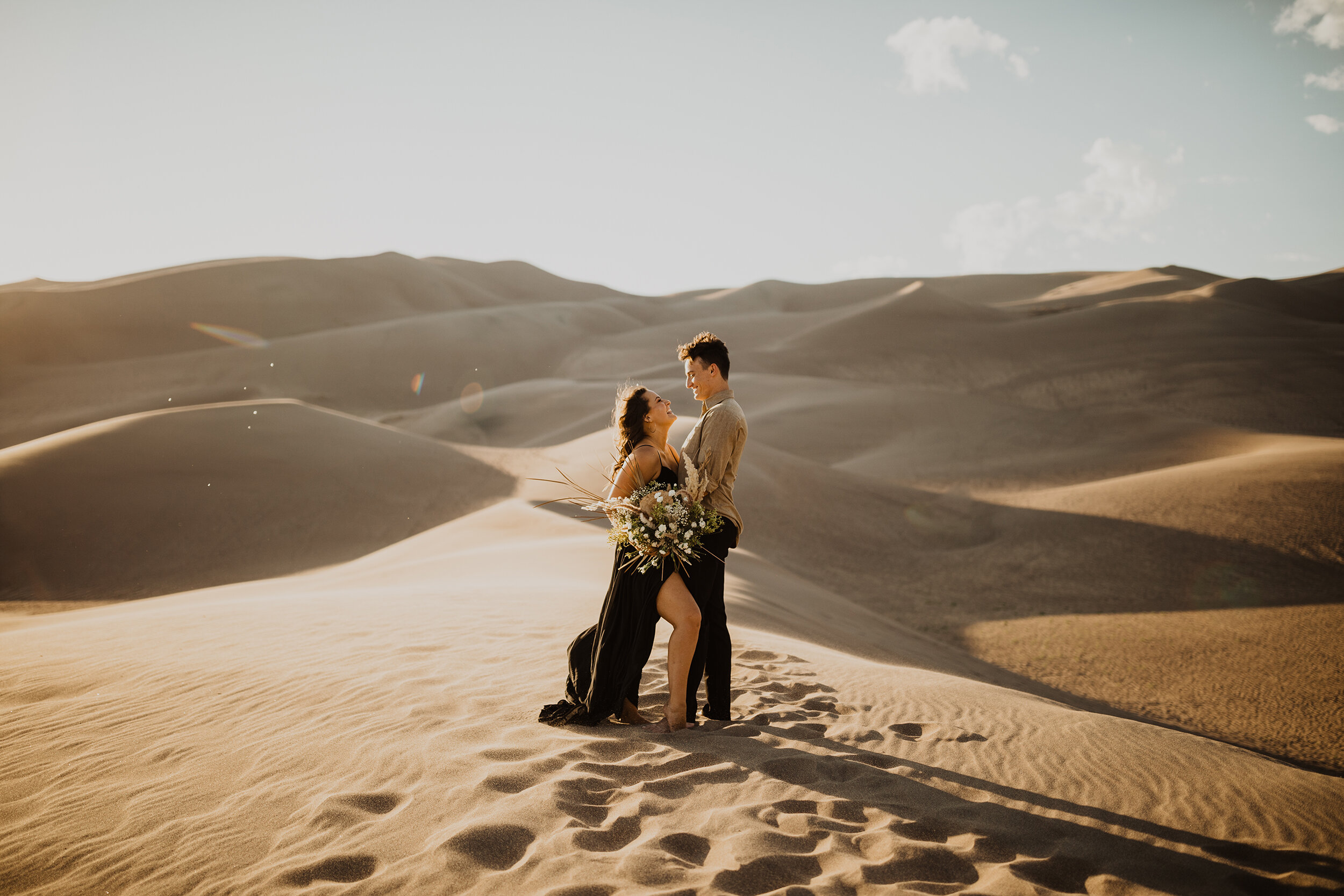 AshleeCrowdenPhotography_coloradoweddingphotographer_sanddunesengagement.jpg