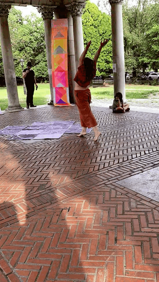 Toni Short dancing at Camila Higuera's TIMES ARE CHANGING: Peace of Paper Exhibit at STOA BK