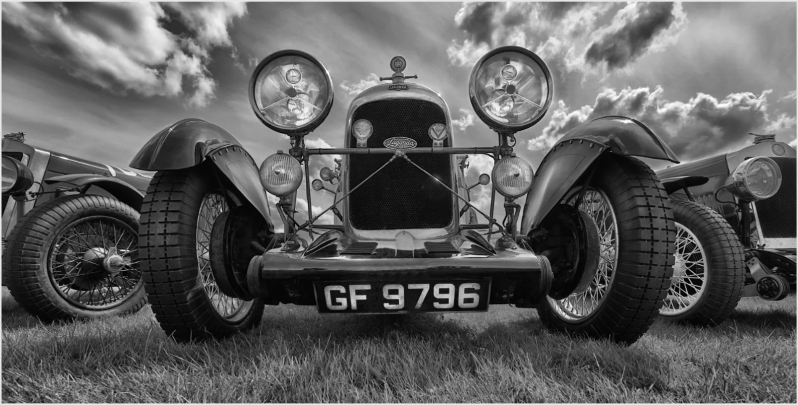  Lagonda:  Using monochrome, a wide angle and a low viewpoint are just a few ways we can capture the world in a different way than we normally see it.