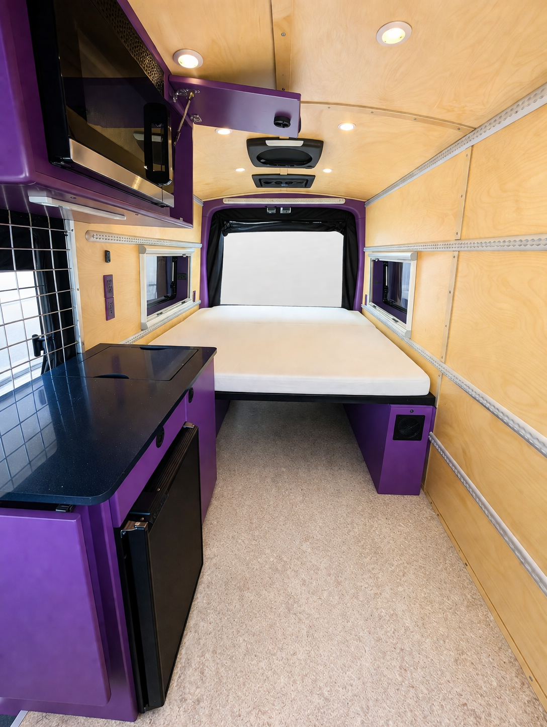 Client Loving Purple Traveling Van