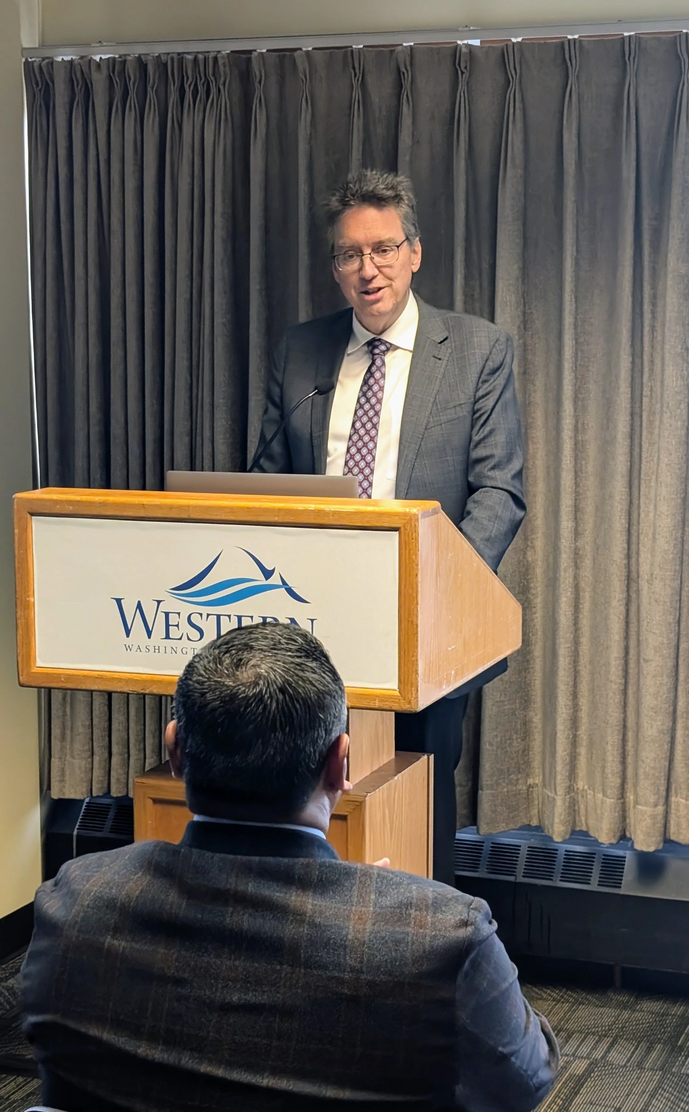 Dr. Brad Johnson, Provost and Executive Vice President of Western Washington University delivering his welcoming remarks. 