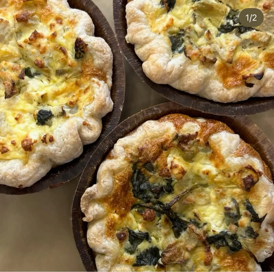 The Food Hub is stocked up on ready to eat meals so you can spend more time out in the garden enjoying the spring 🪏 🌼 
.
Quiches and savory pies from @amayasbakery3 
.
Pizza bakes in 5 minutes from @feralslice 
.
Scrumptious samosas, curry, and squ