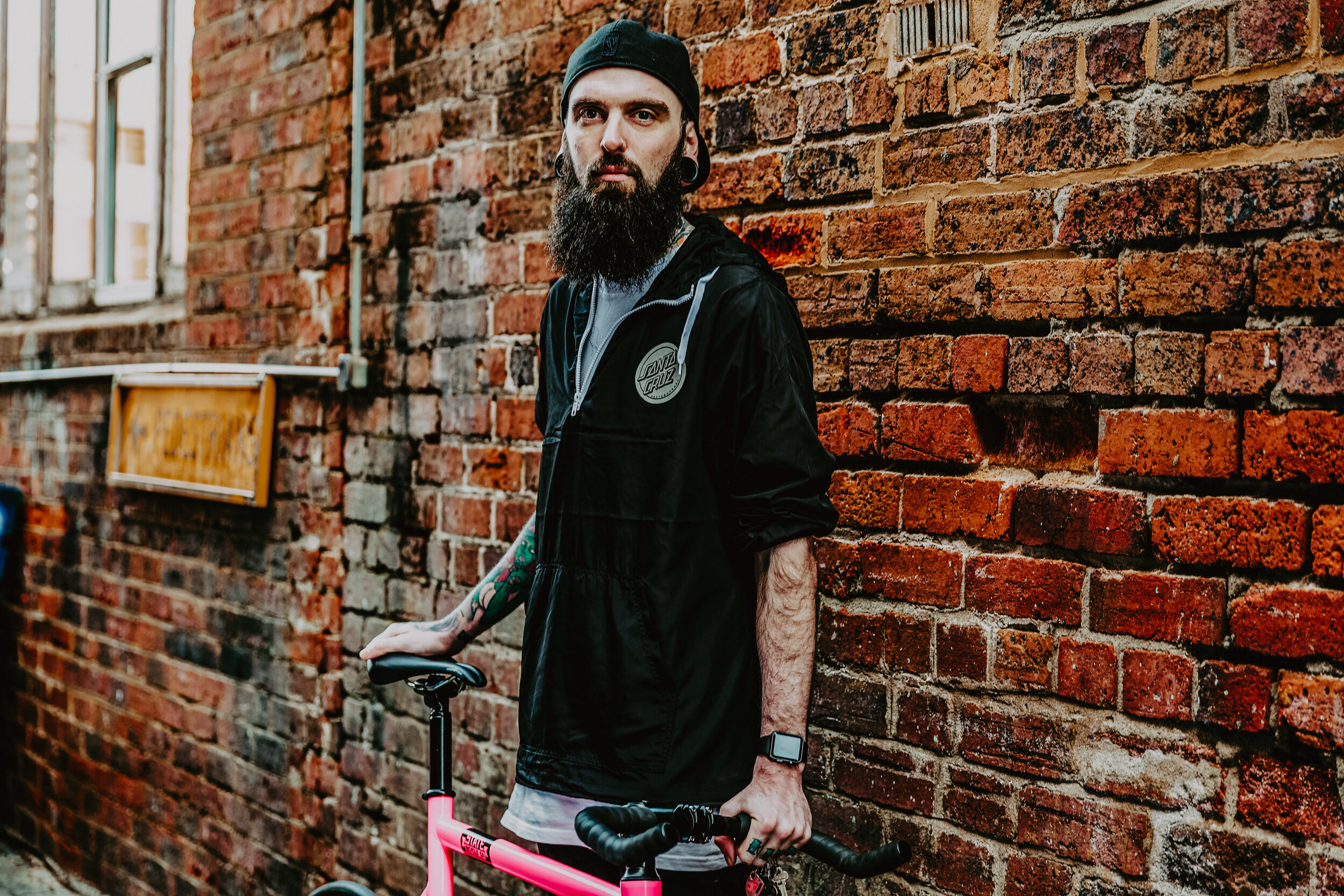 rider-portrait-beard-bike-tattoos