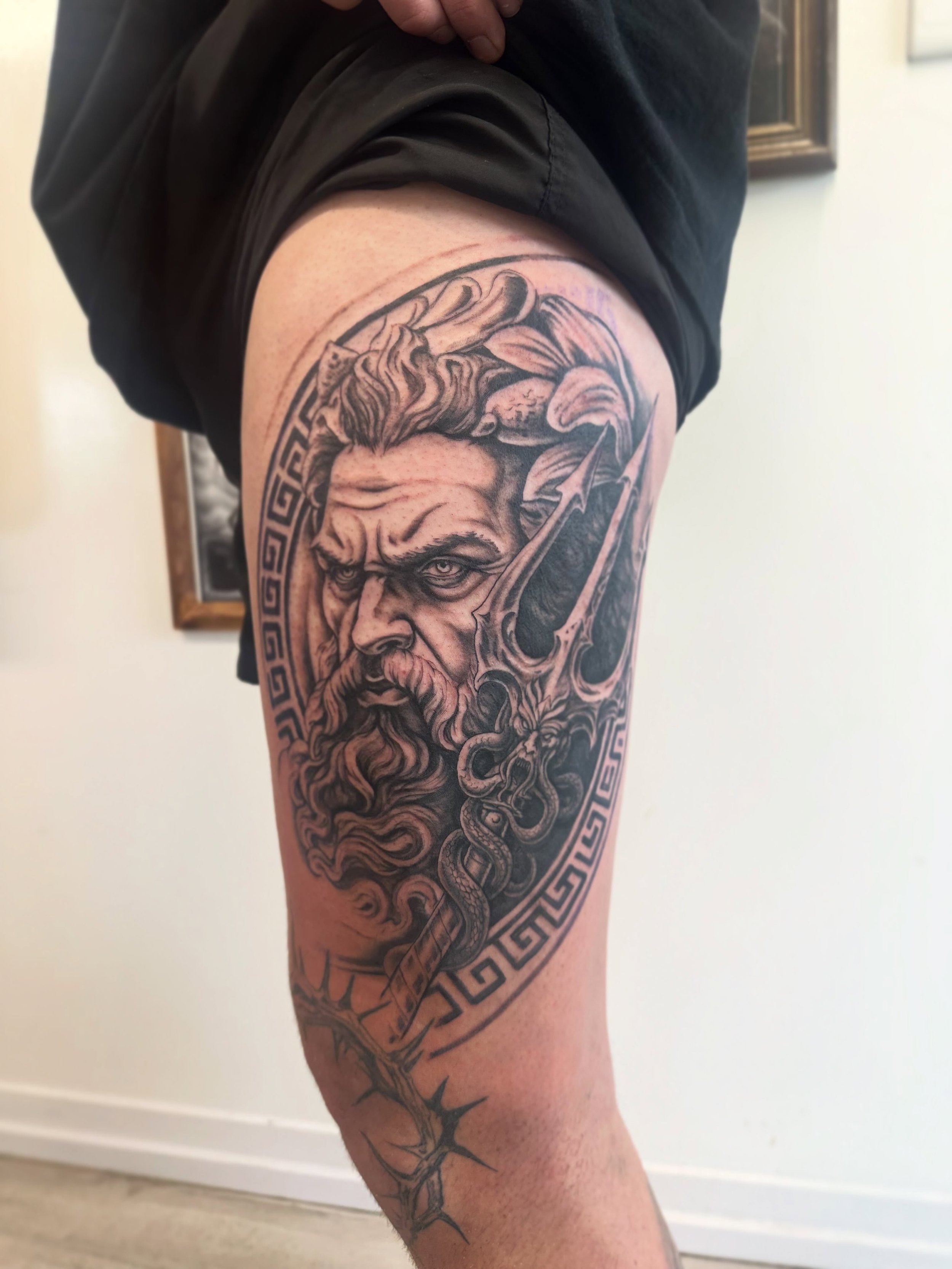 Added Poseidon to @jack_f_bell_nz leg sleeve 🌊.
.
.
.
.
#tattoo #blackandgreytattoo