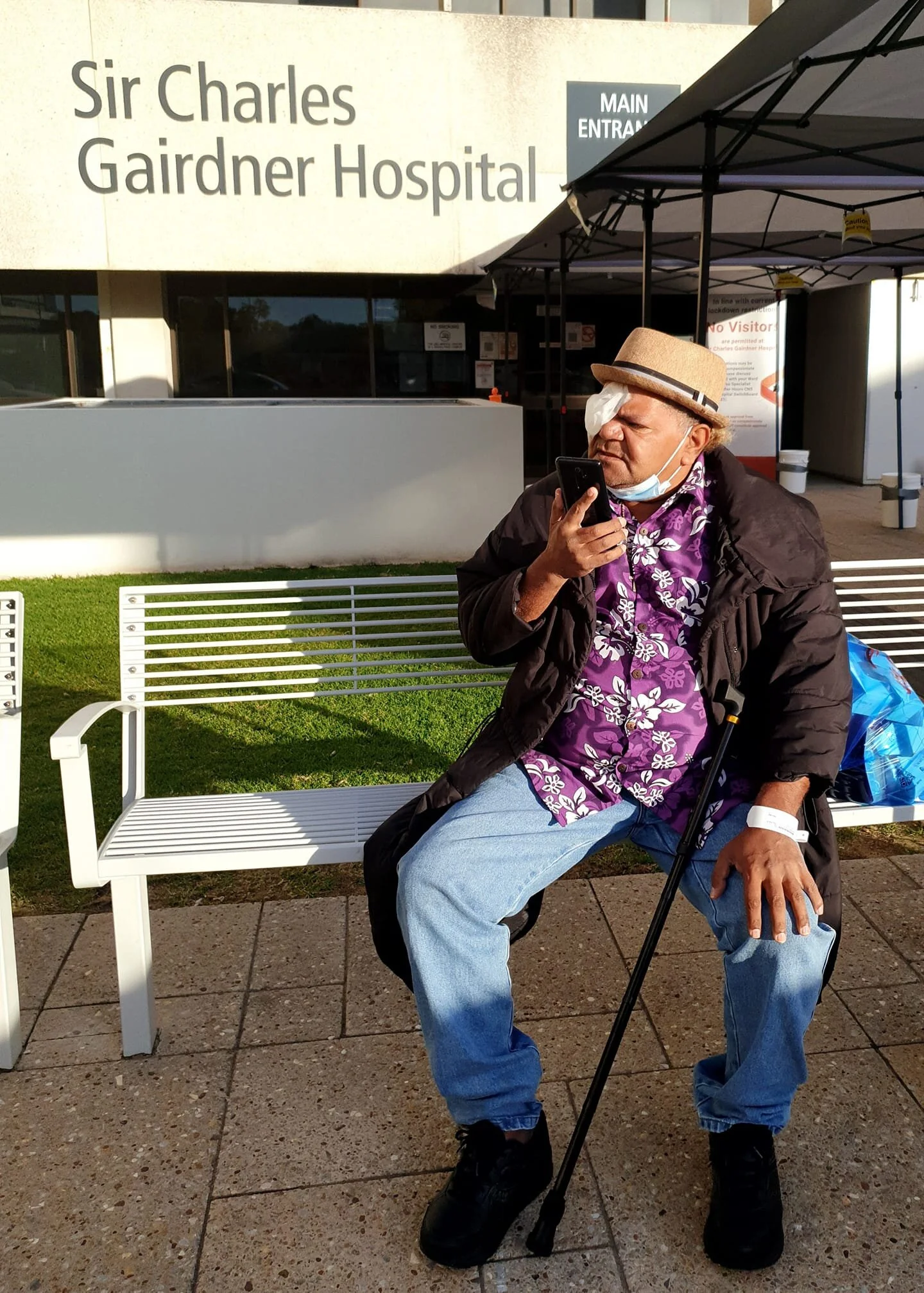 Yabu-Band singer Delson Stokes sits outside of Sir Charles Gairdner Hospital (Source: Facebook)