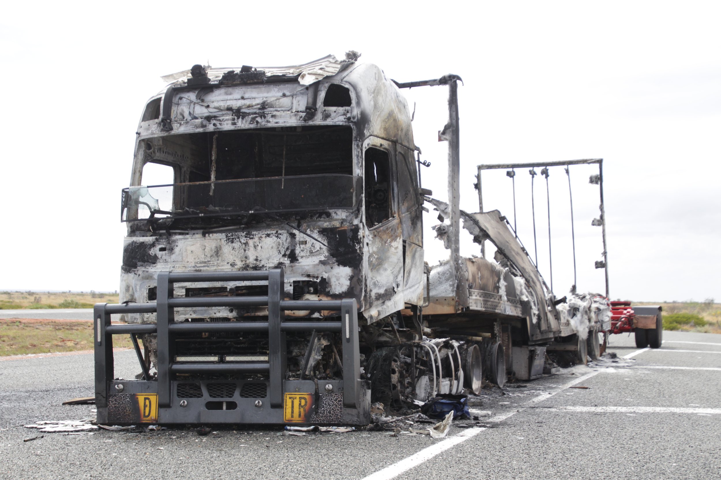 TRUCK GUTTED ON ROADSIDE