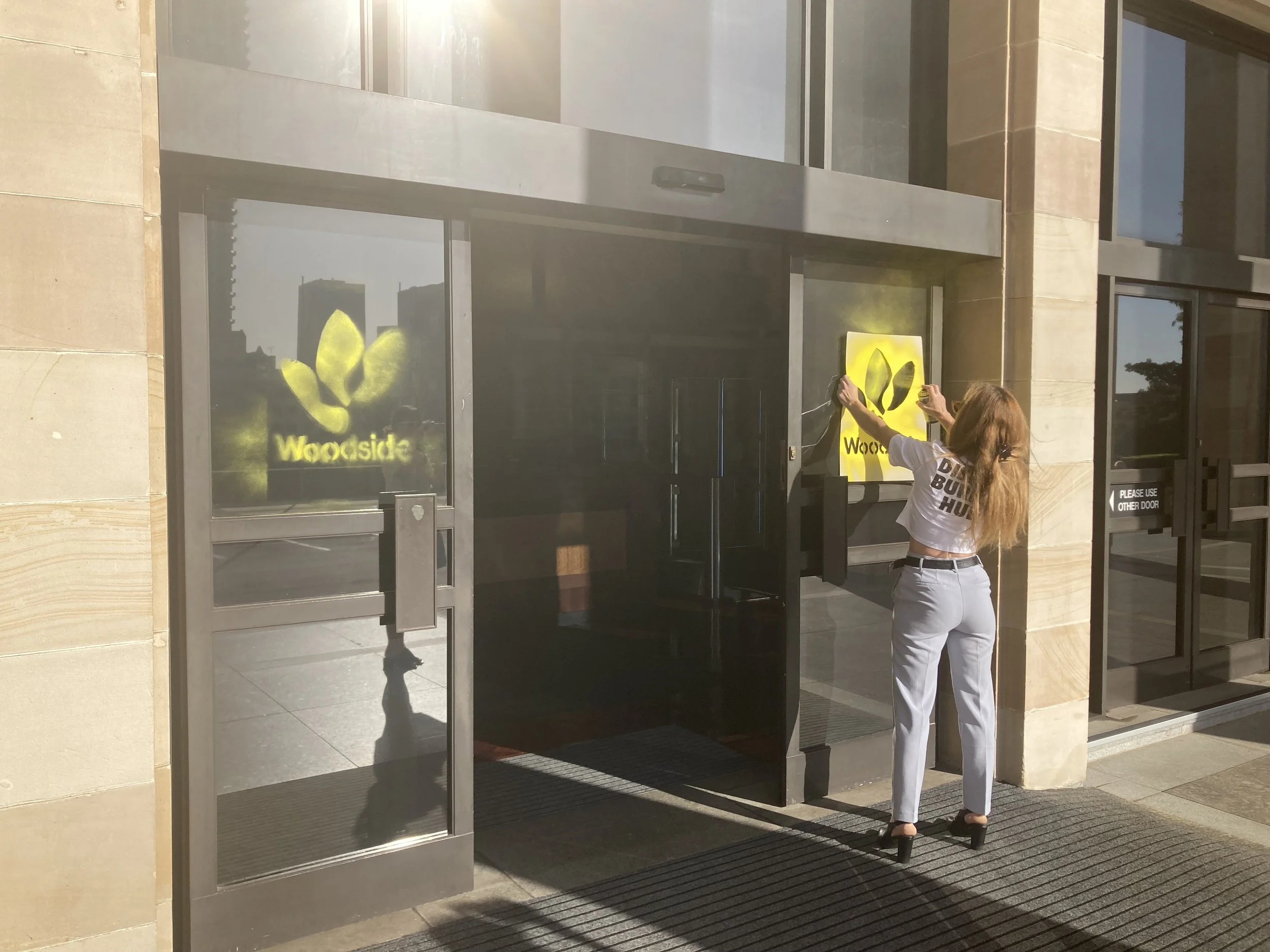 WA PARLIAMENT SPRAYED WITH WOODSIDE LOGO IN BURRUP HUB PROTEST