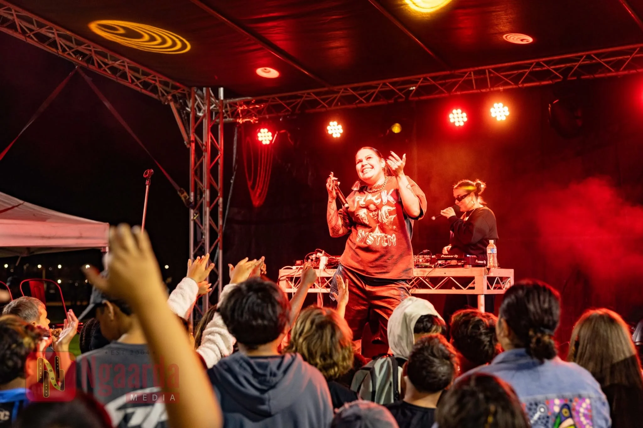 Barkaa performing for the youth in Newman