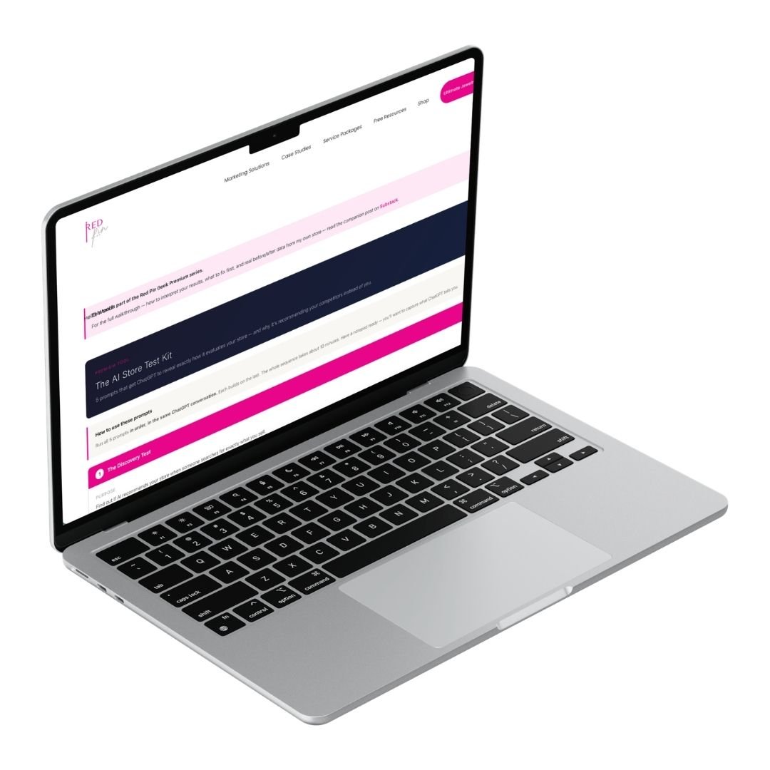 Angled laptop mockup displaying the Red Pin Geek website homepage on a light gray background.