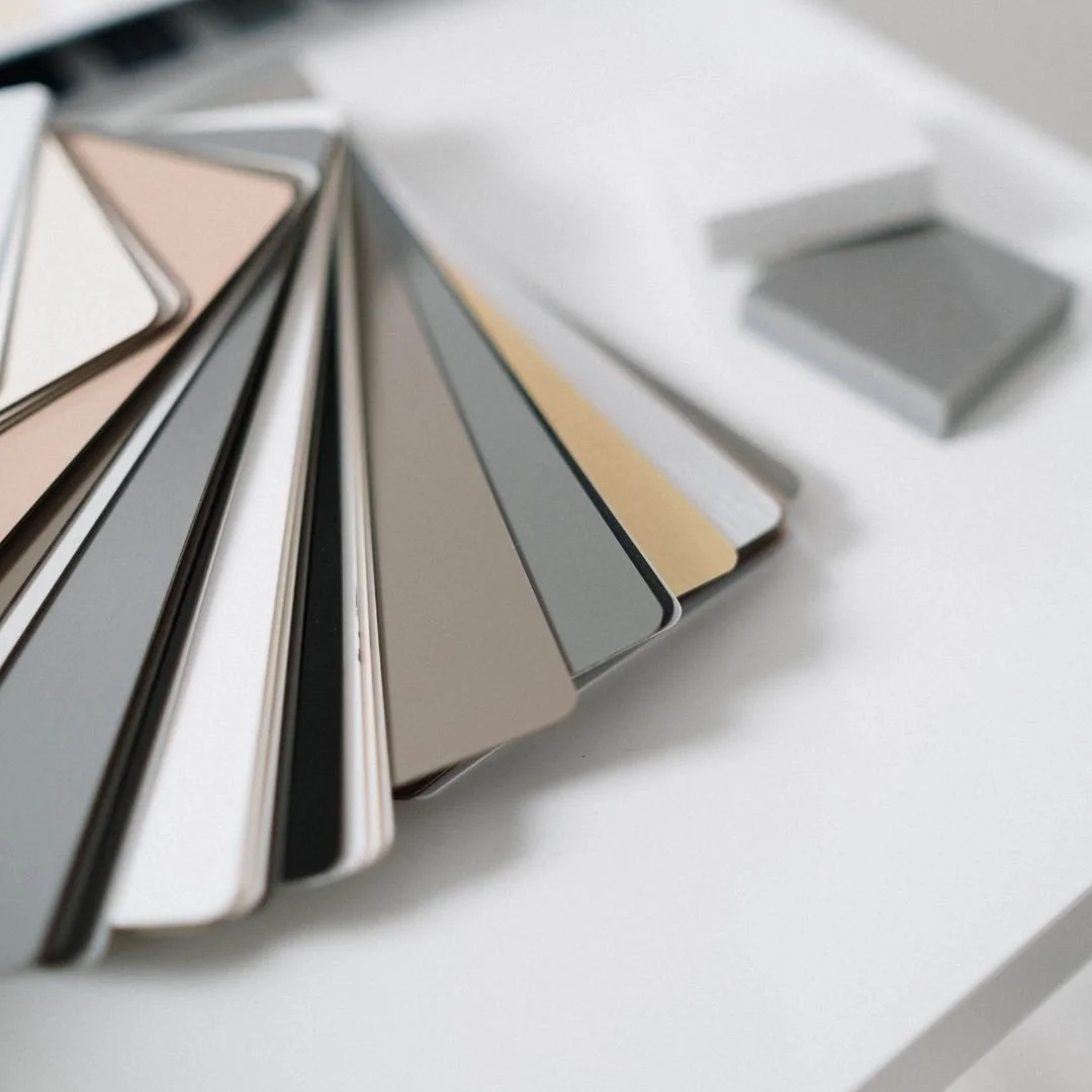 brand color chips fanned out sitting on a desk