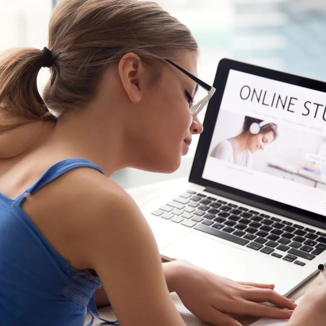 a woman taking an online course on a computer