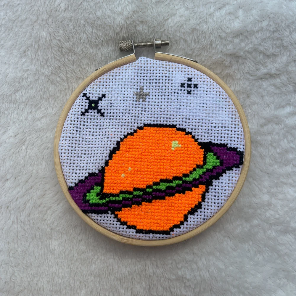 planet cross stitch — MEG CLEMMENSEN