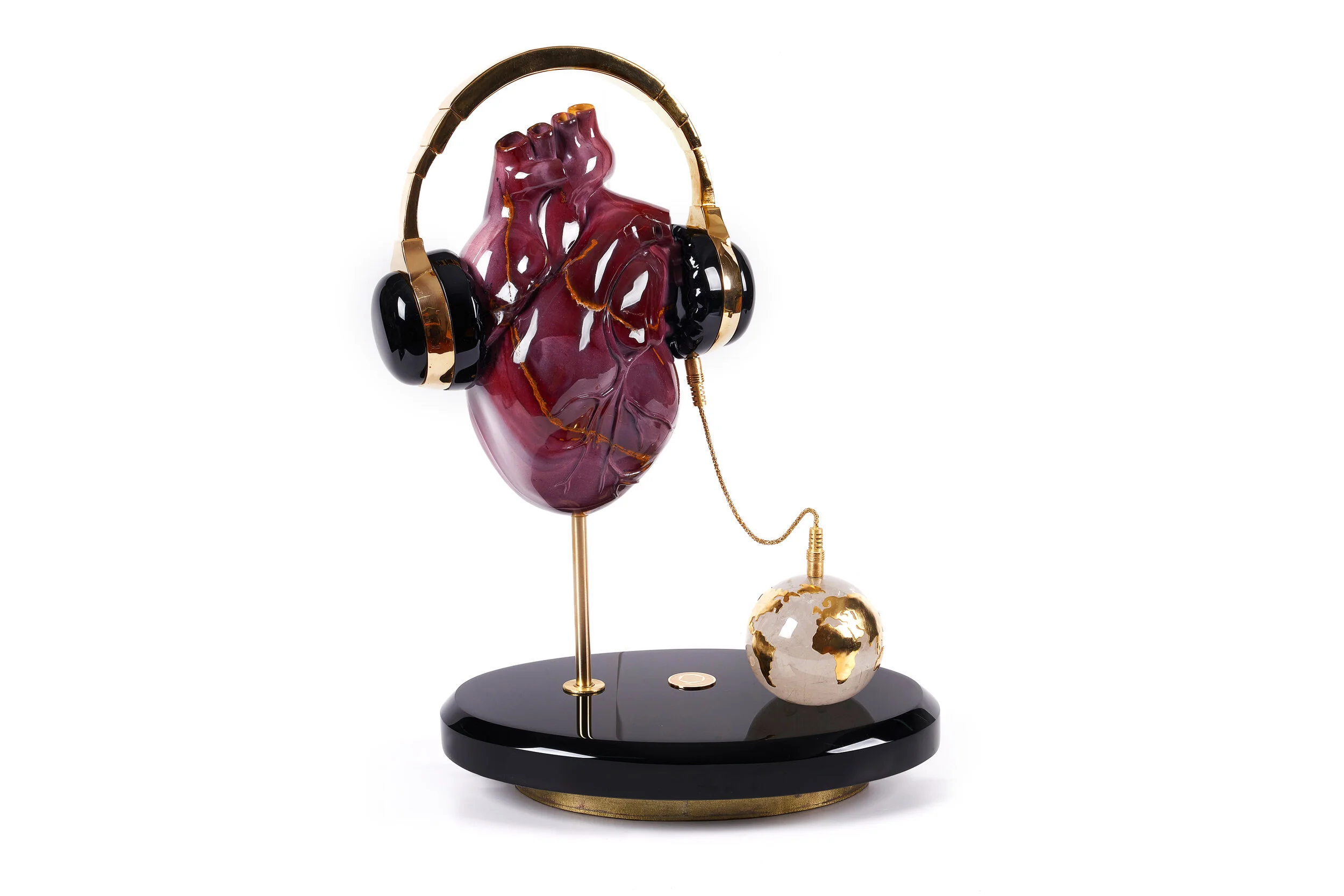 Gemstone sculpture- Listening to the Earth-gemsandcarvings.com