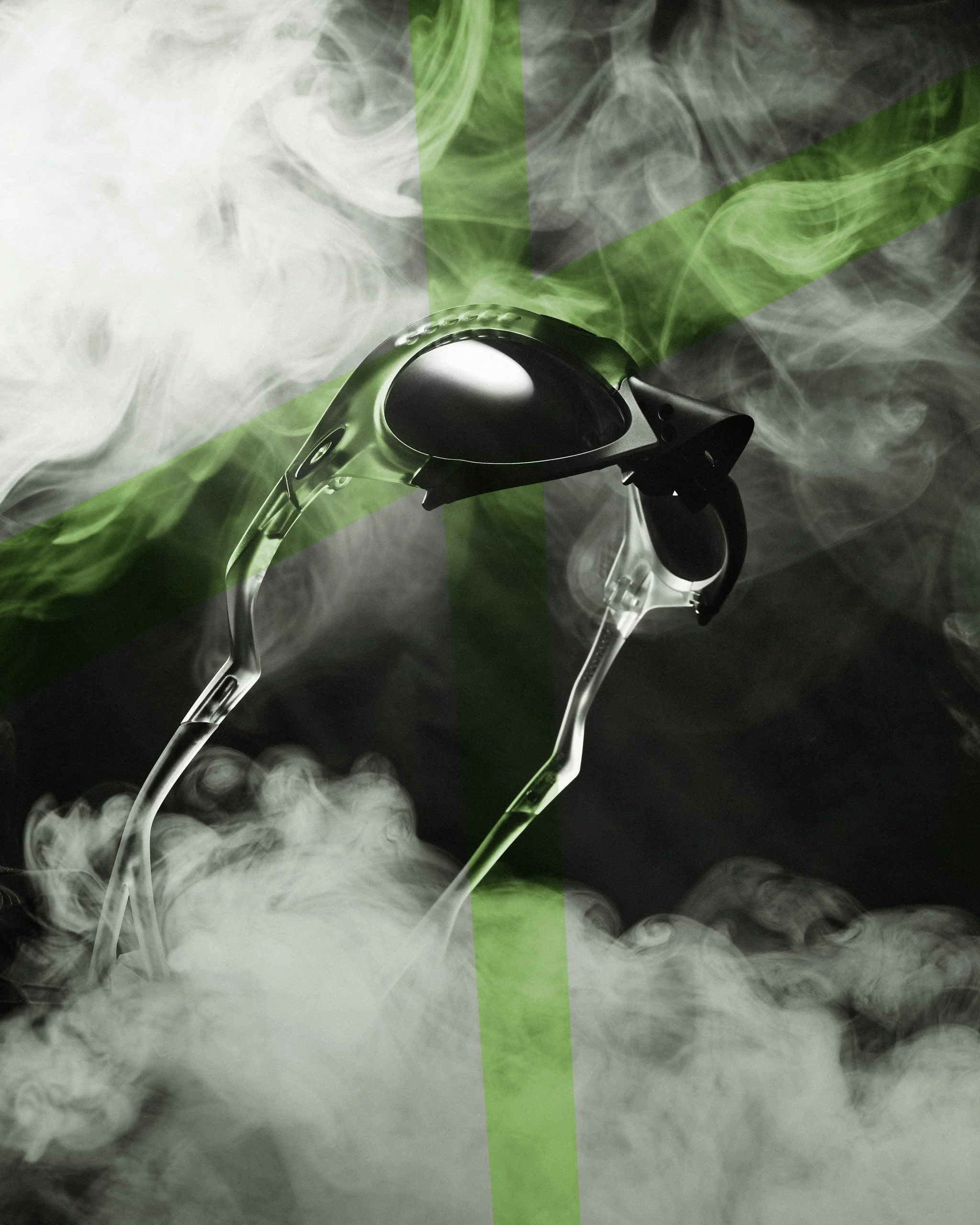 Futuristic sunglasses with a sleek design surrounded by green and white smoke accents.
