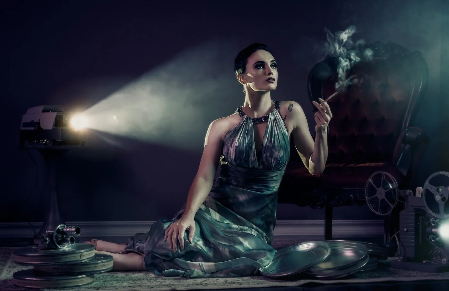 Editorial Photo of a girl in green dress smoking and watching old movies