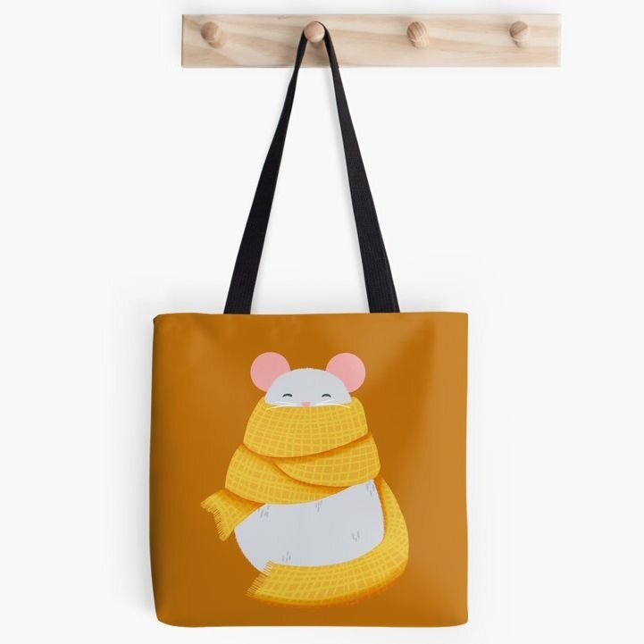 elevate your style with this adorable companion cozy mouse tote! perfect for essentials, shopping, books, or whatever you want to keep close, it adds a dash of warmth to every outing. Find it in my @redbubble  shop
.
.
.
#CustomHoodie #WhimsicalStyle