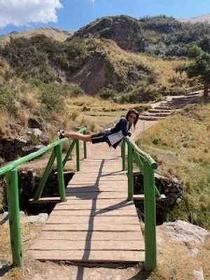 hanging over bridge in Peru.jpeg