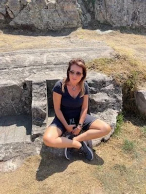 meditating on crystal stone in machupichu.jpeg