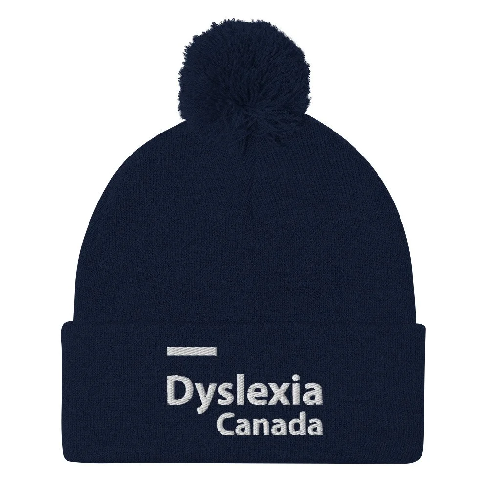 pom-pom-knit-cap-navy-front-66cf7107bafc2.jpg