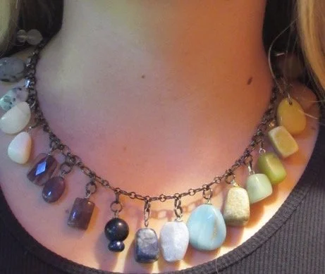 Chakra Necklace: - Coral, Red Jade, Mookaite Jasper, Carnelian, Agate, Yellow Jasper, Yellow Jade, Serpentine, Aventurine, Blue Lace Agate, Chrysoprase, Sodalite, Goldstone, Lapis Lazuli, Amethyst, Snow  Quartz, Dalmatian Stone, Agate, Rose Quartz an