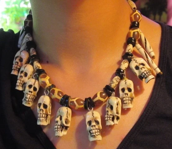 Skull Necklace - Hand-carved bone skulls and beads with Jet and African agate beads